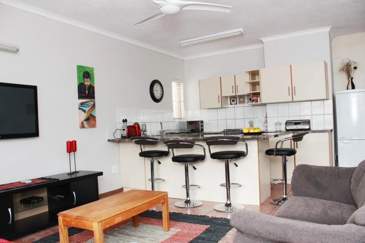 Kitchen or kitchenette in At One Lodge