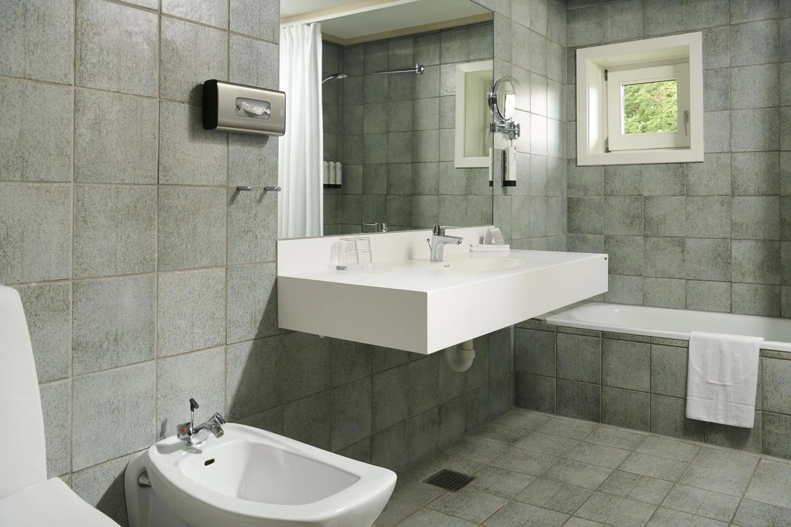 Bathroom in Munkebjerg Hotel