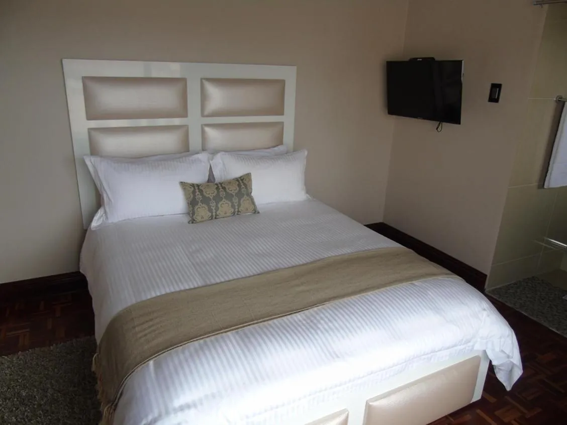 Bed in The Musafer Travel Lodge