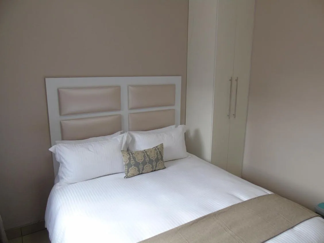 Bed in The Musafer Travel Lodge