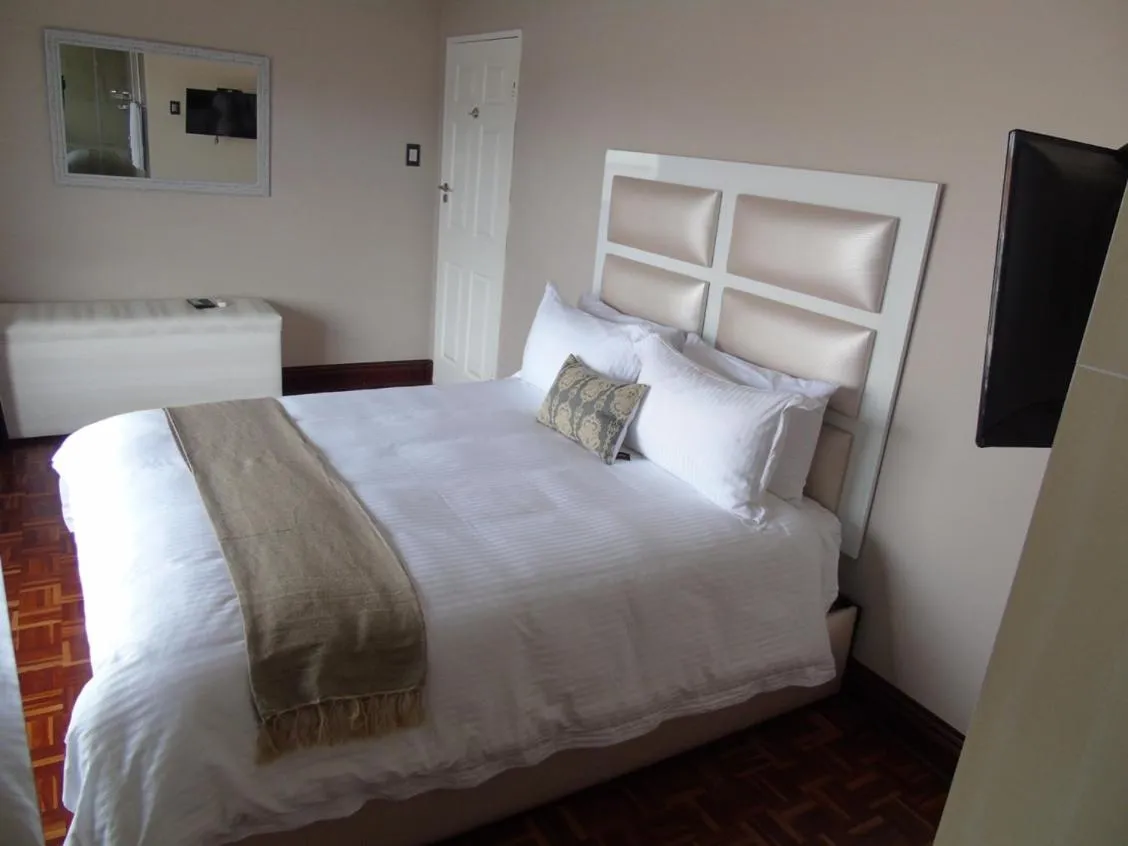 Bed in The Musafer Travel Lodge