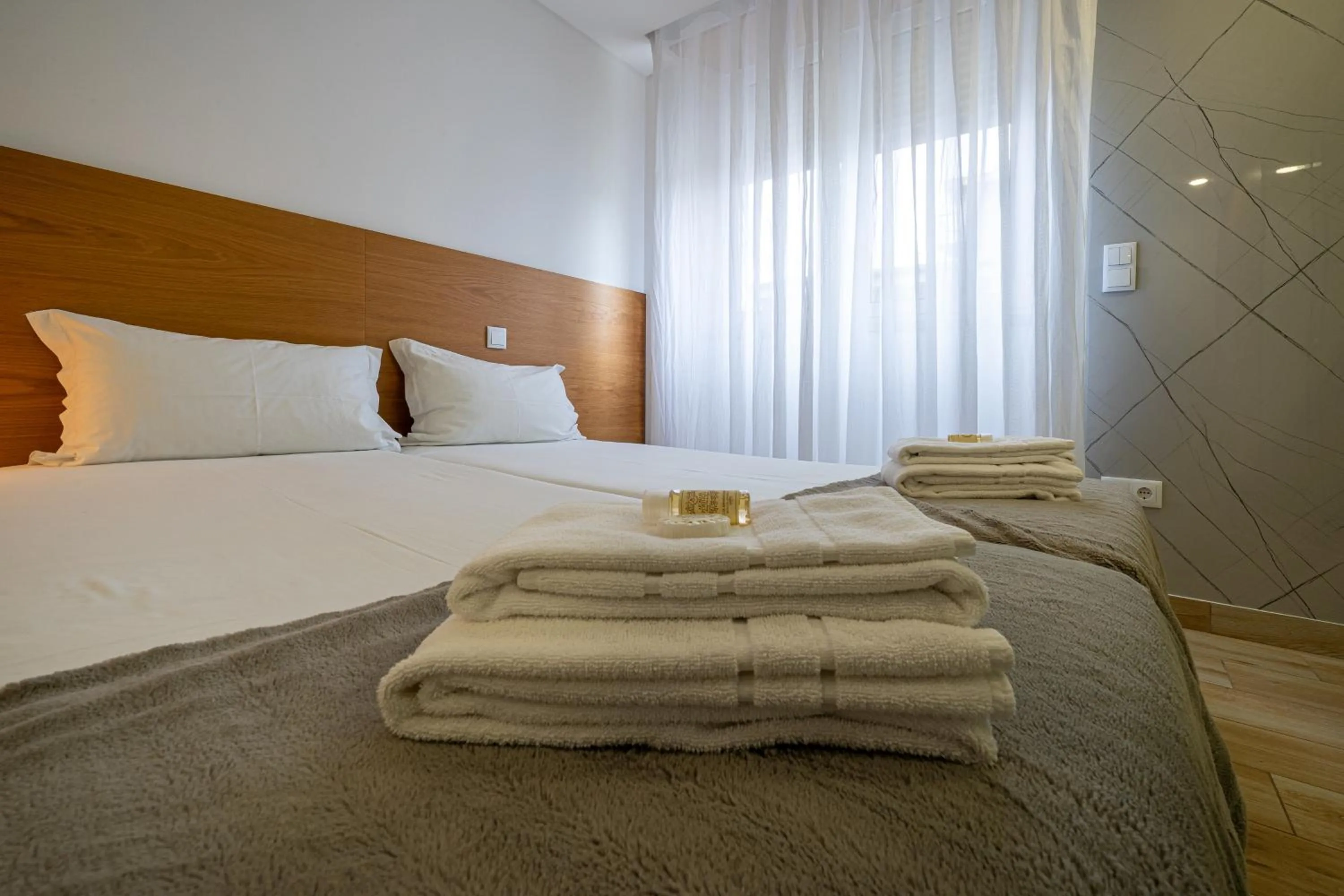 Bed in Central Suites