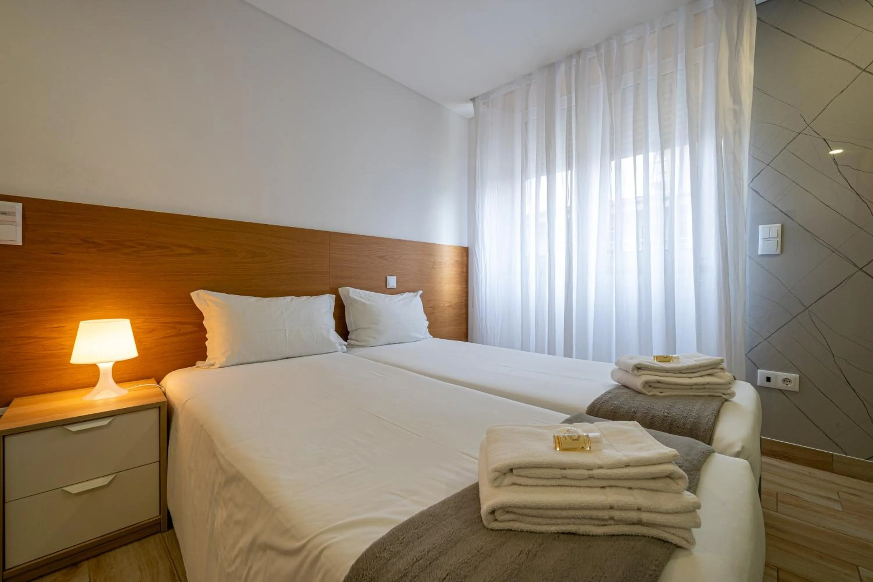 Bed in Central Suites