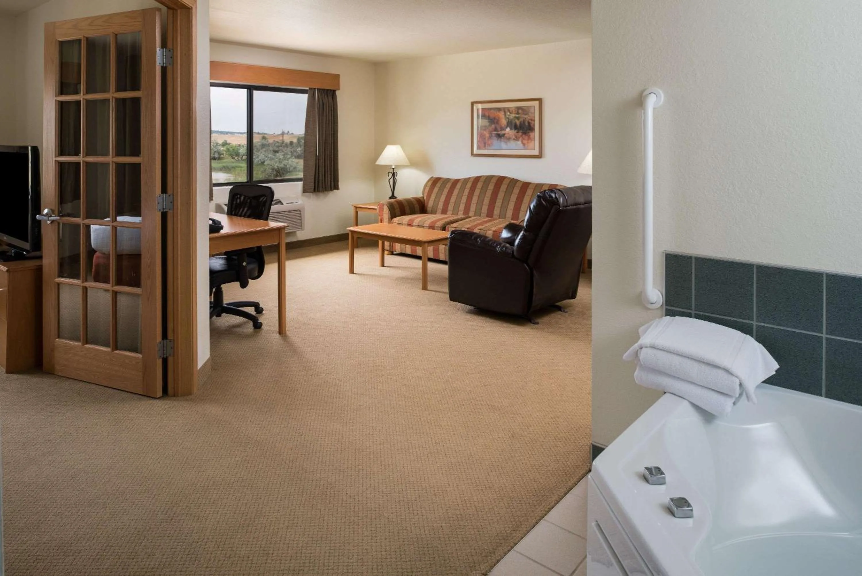 Photo of the whole room in AmericInn by Wyndham Belle Fourche