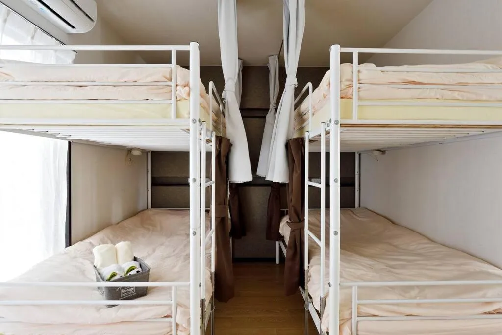 Bed in Keimei Guest House