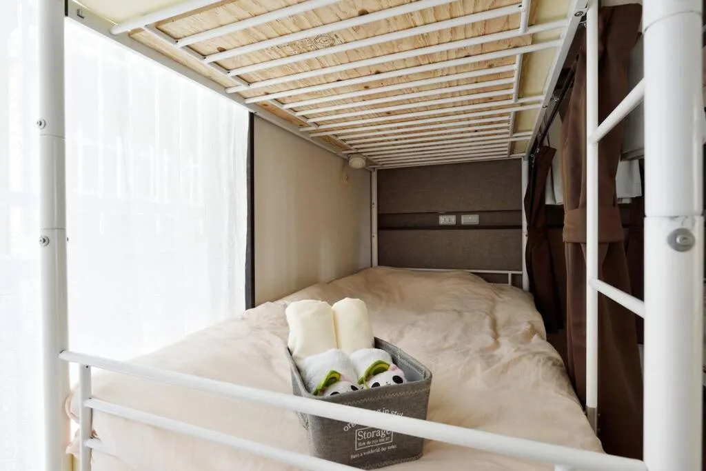 Bed in Keimei Guest House