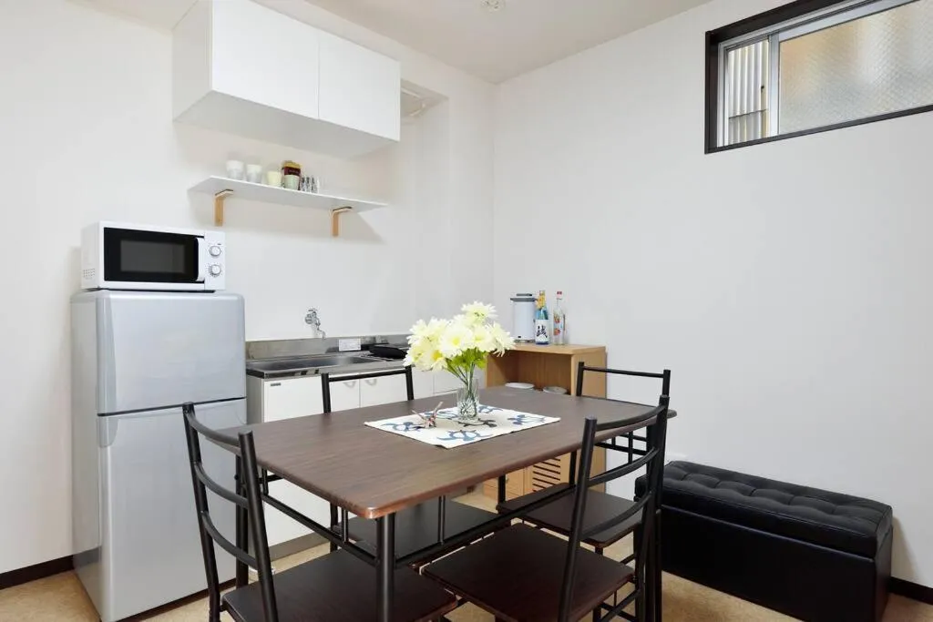 Communal lounge/ TV room in Keimei Guest House