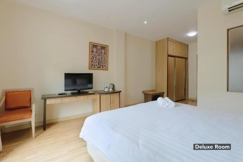 Bed in Mutiara Suites