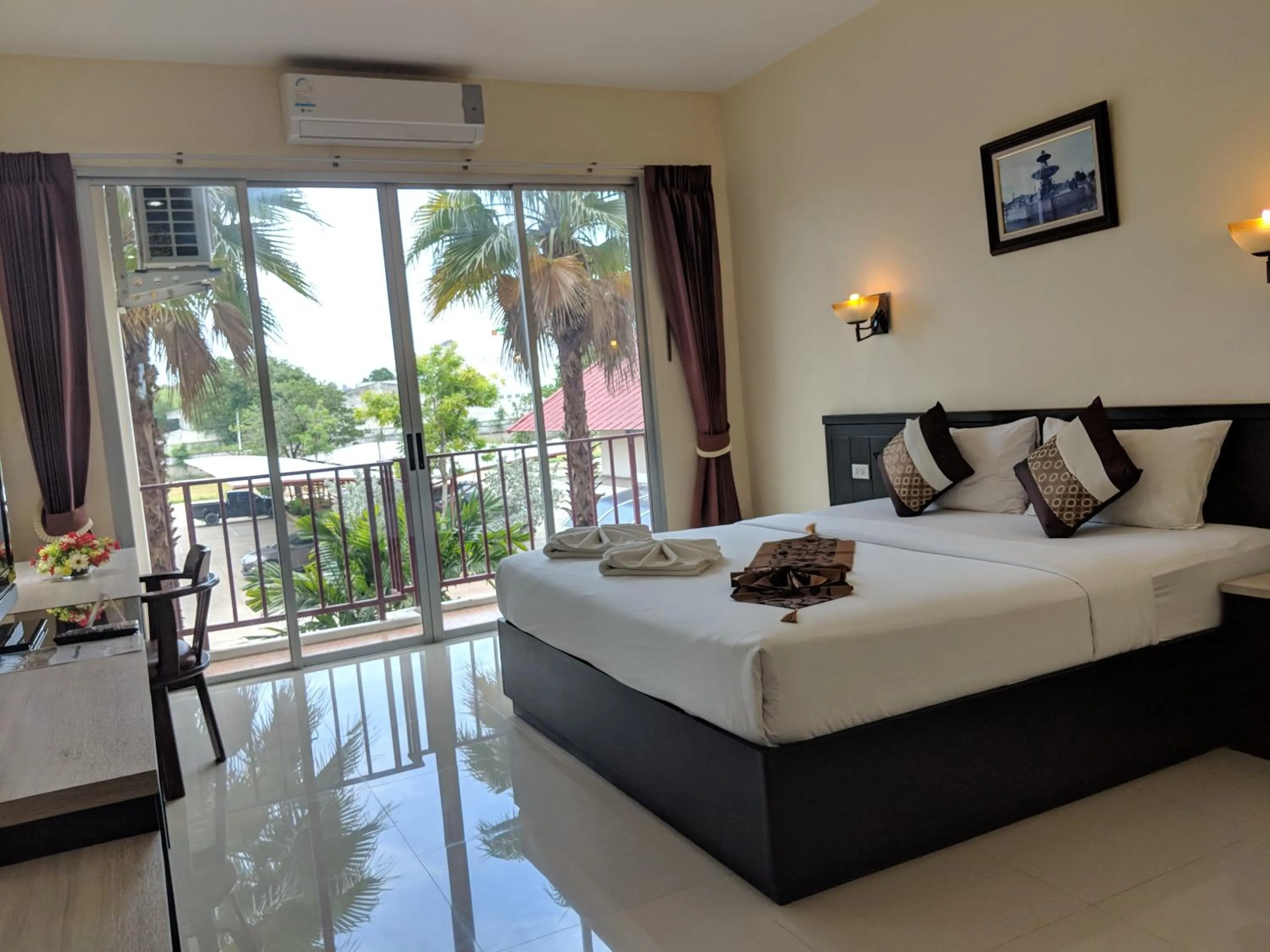 Bed in Kanokan Hotel