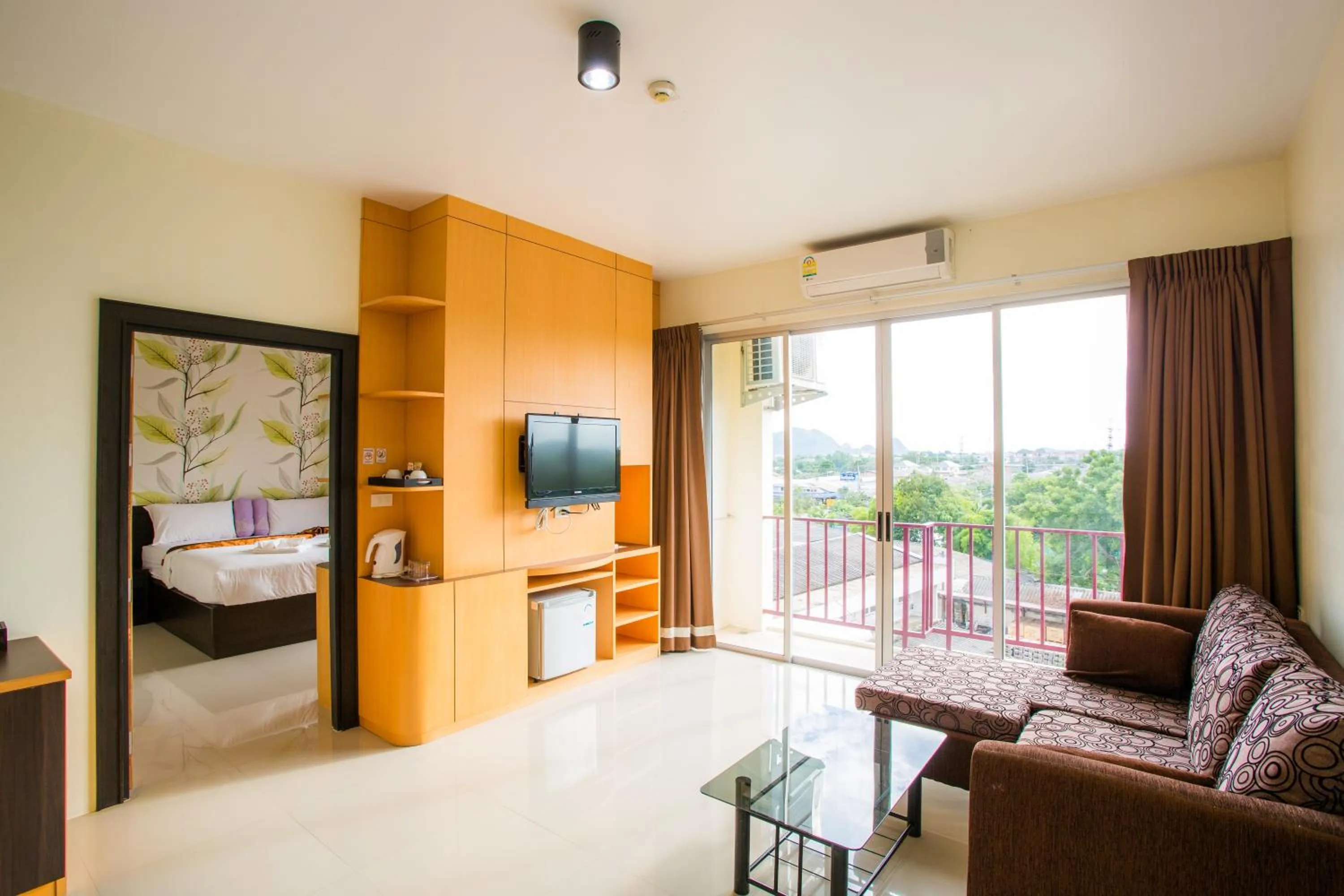 Bed in Kanokan Hotel