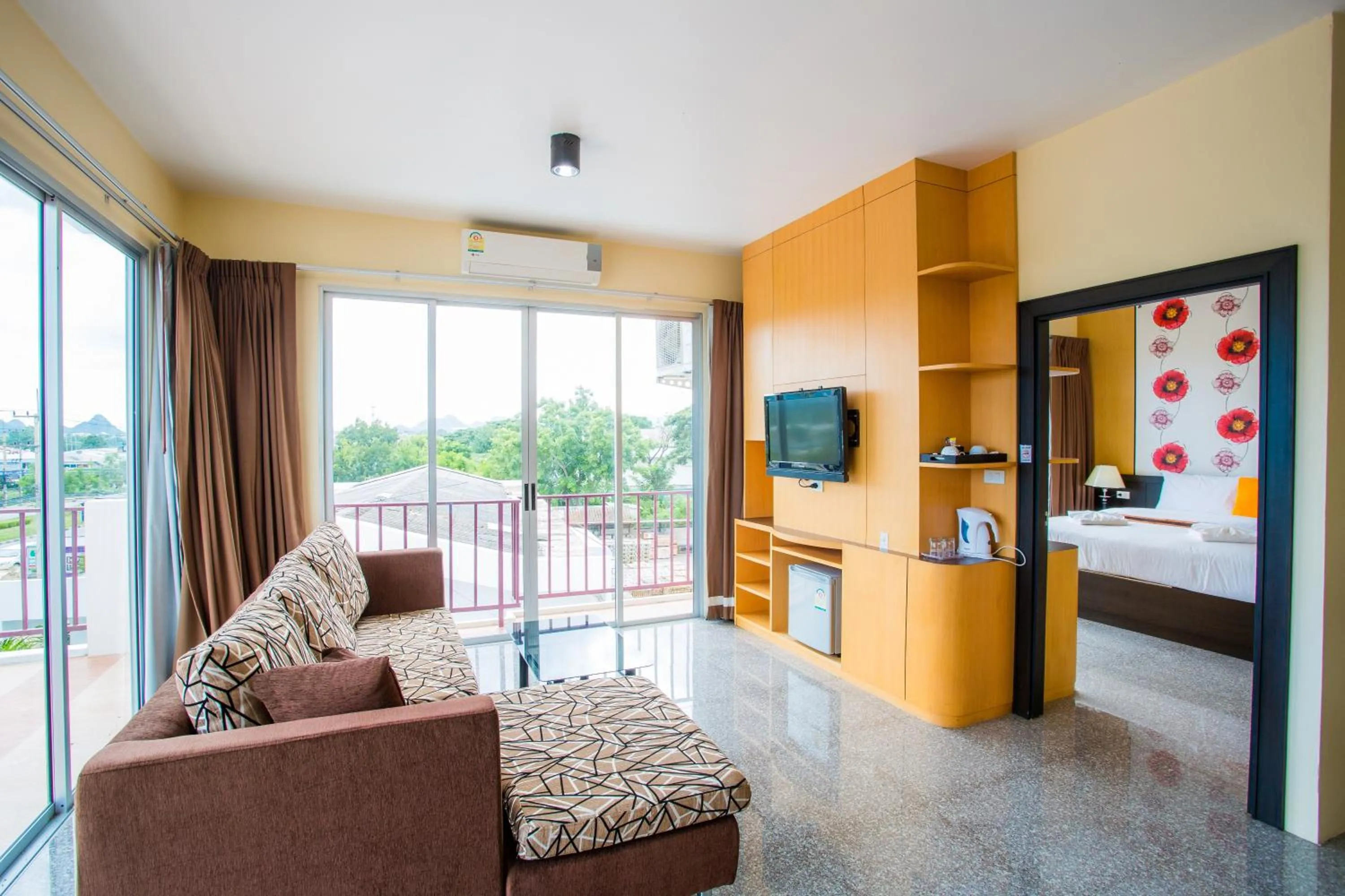 Bed in Kanokan Hotel