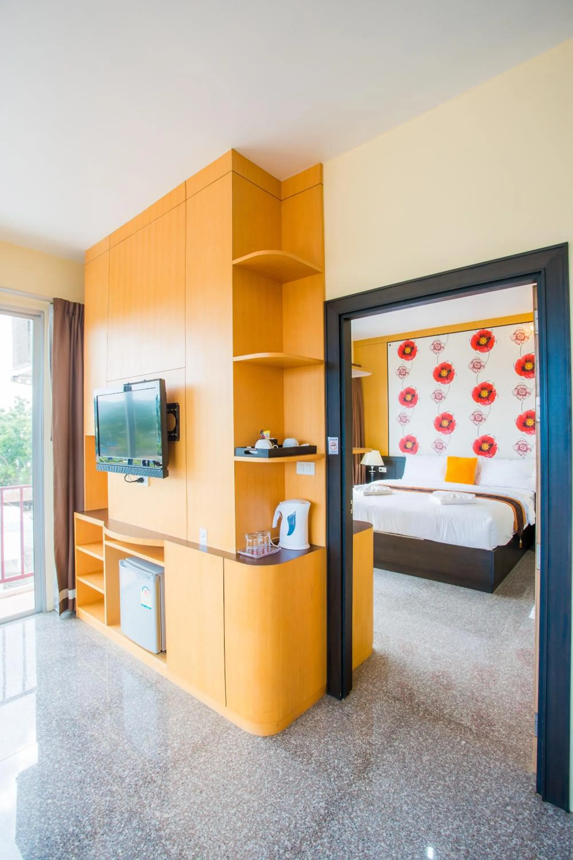 Bed in Kanokan Hotel