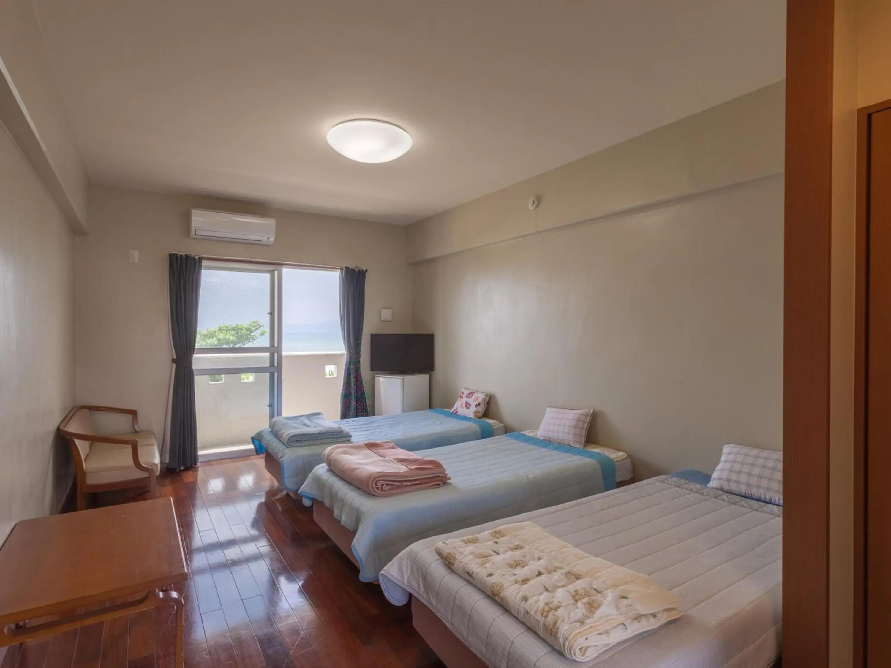 Bedroom, Bed in Uminchuno Yado Bedroom, Bed in Uminchuno Yado