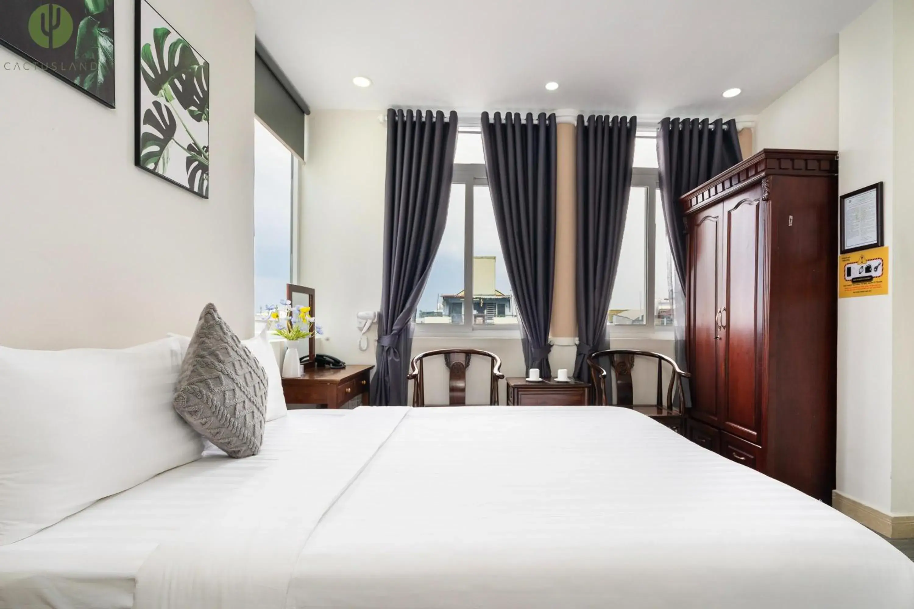 Photo of the whole room, Bed in Cactusland Hotel Tan Binh Near T3 Station Photo of the whole room, Bed in Cactusland Hotel Tan Binh Near T3 Station