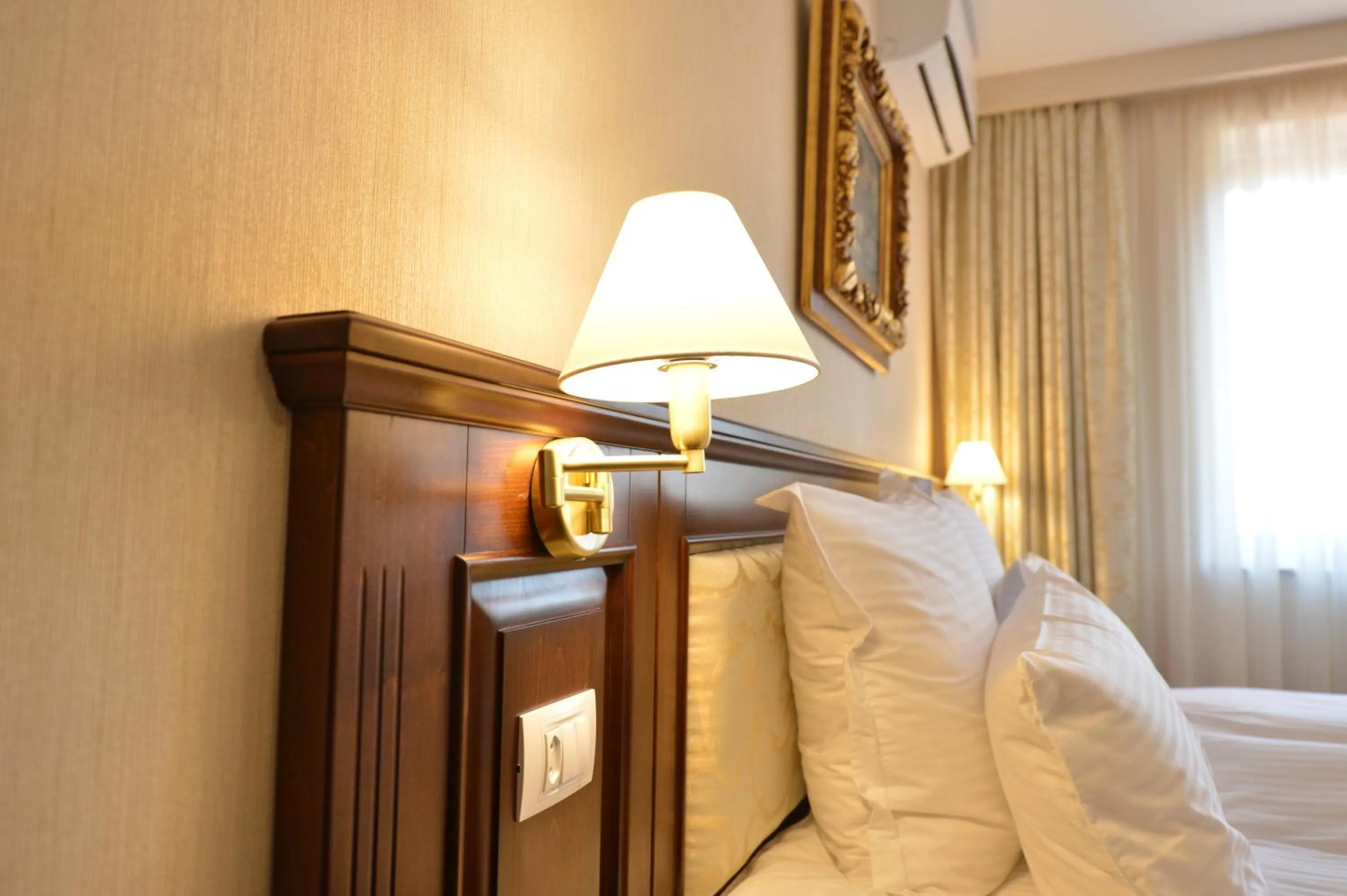 Bed in Noblesse Boutique Resort