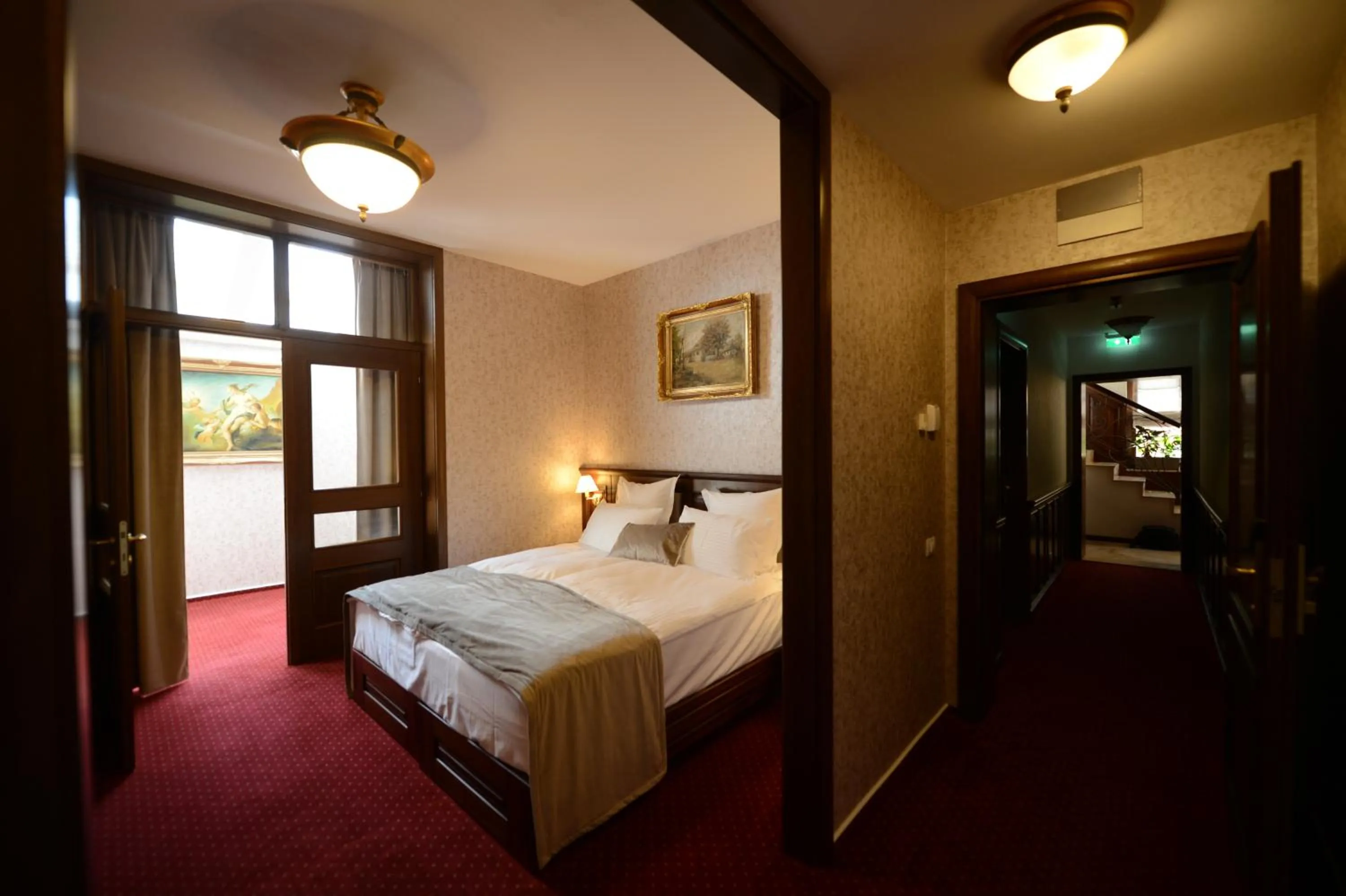 Living room, Bed in Noblesse Boutique Resort