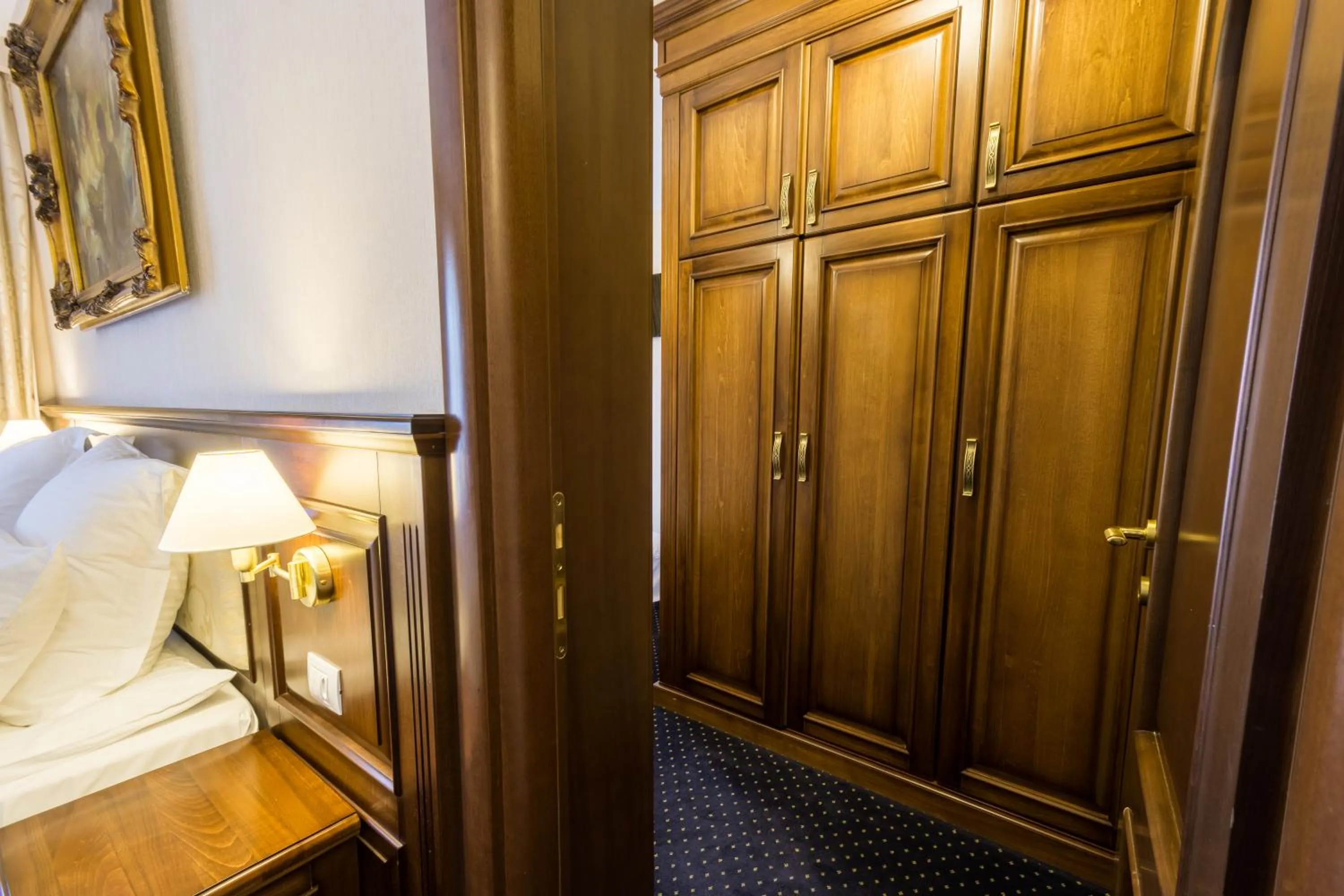 Bed in Noblesse Boutique Resort