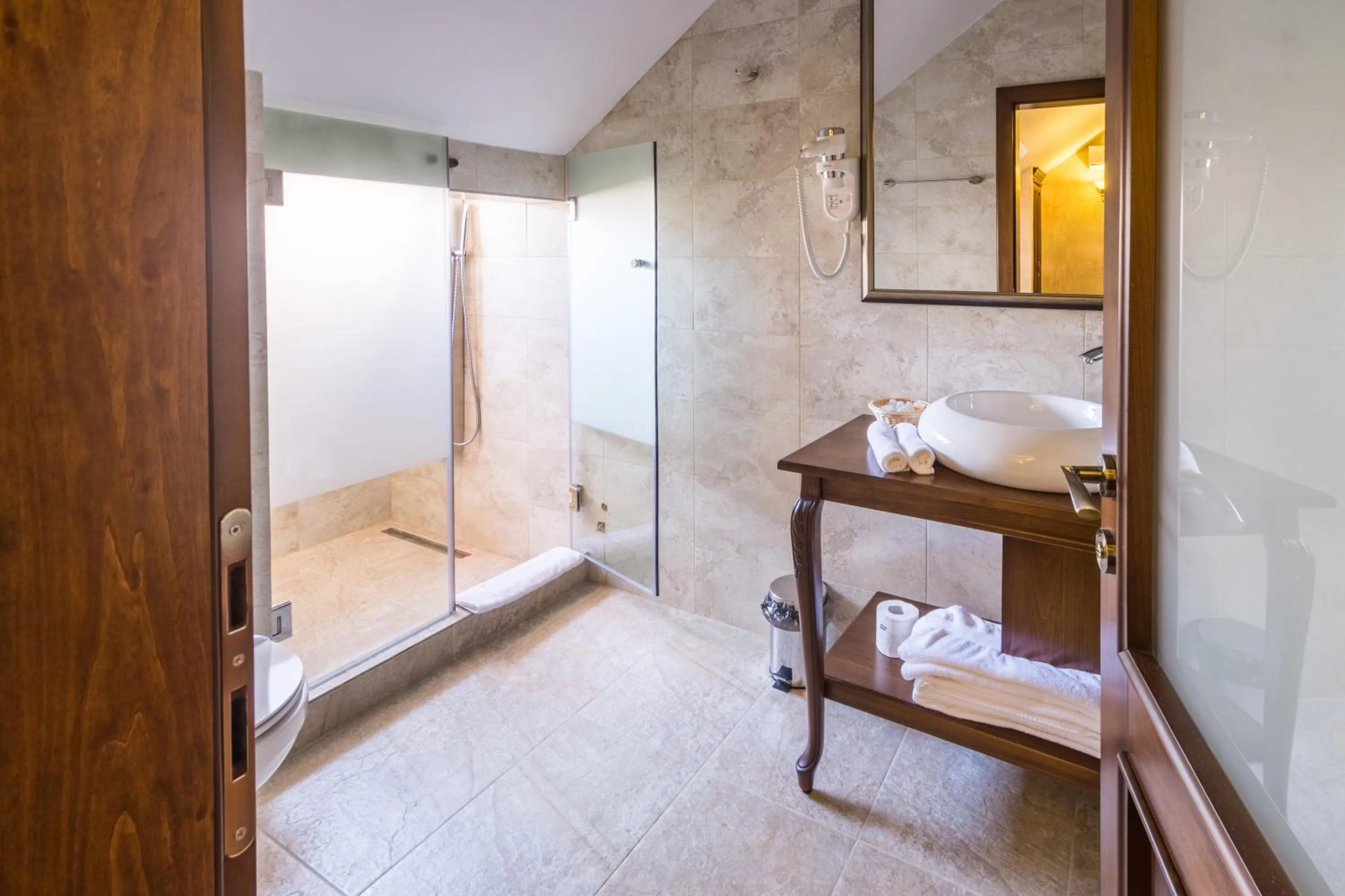 Bed in Noblesse Boutique Resort