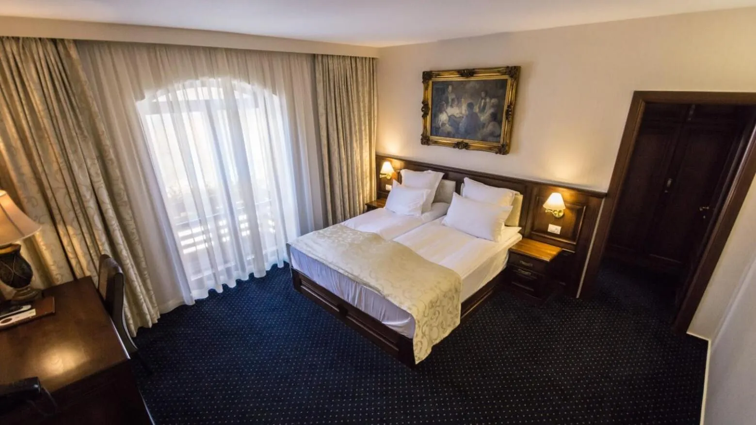 Bed in Noblesse Boutique Resort