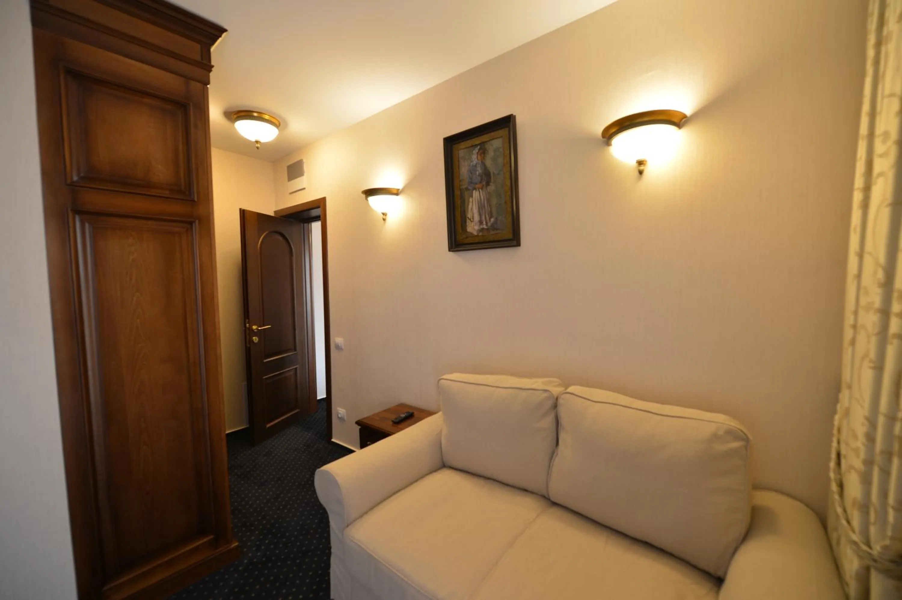 Bed in Noblesse Boutique Resort