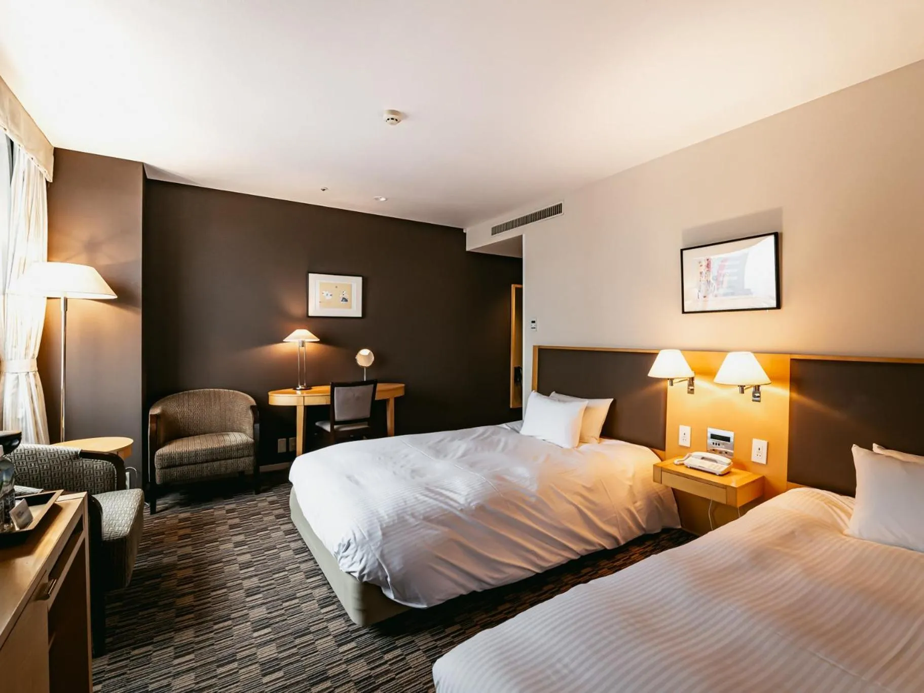 Bed in Oarks Canal Park Hotel Toyama