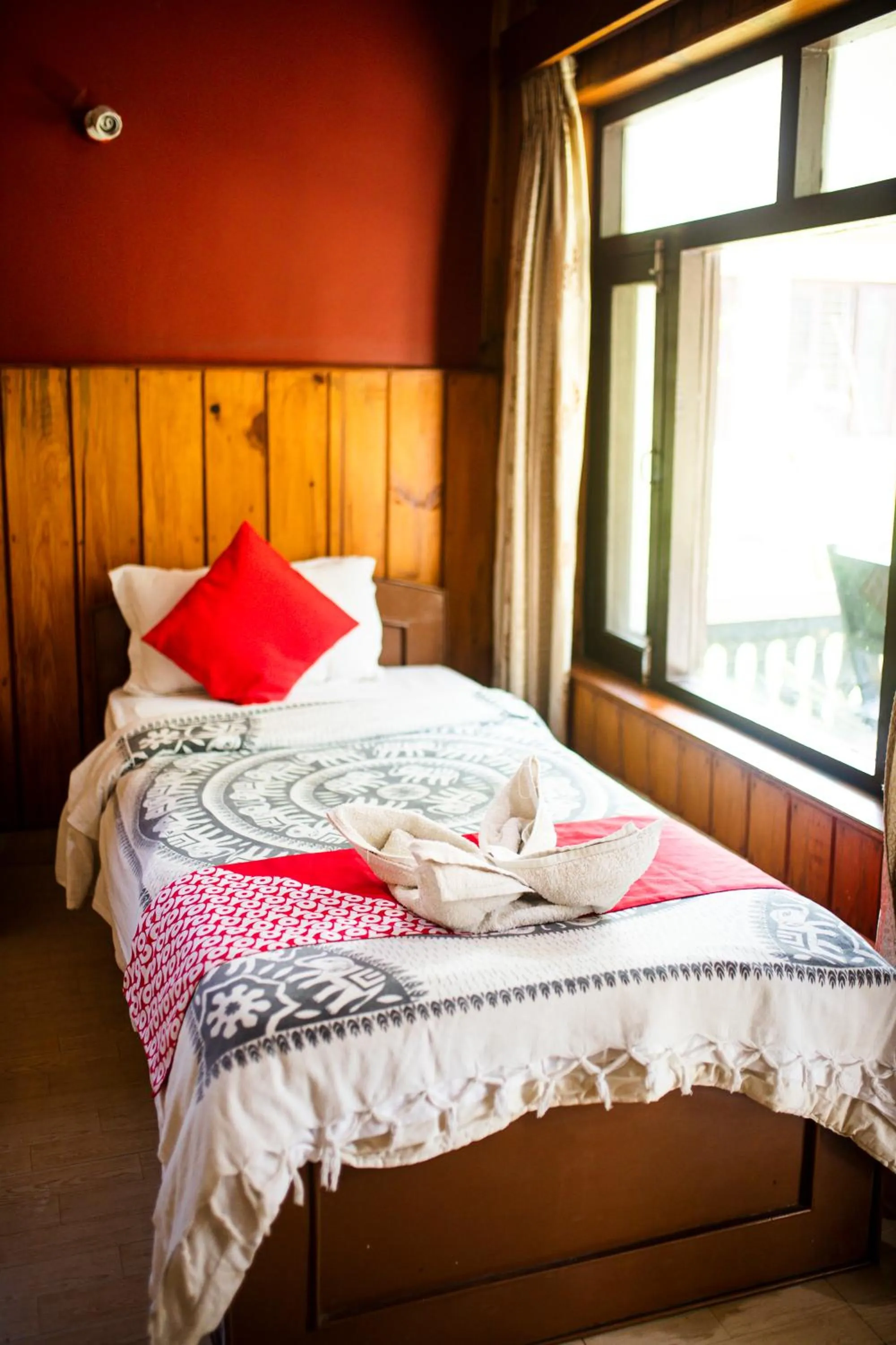 Bed in Chitwan Riverside Resort