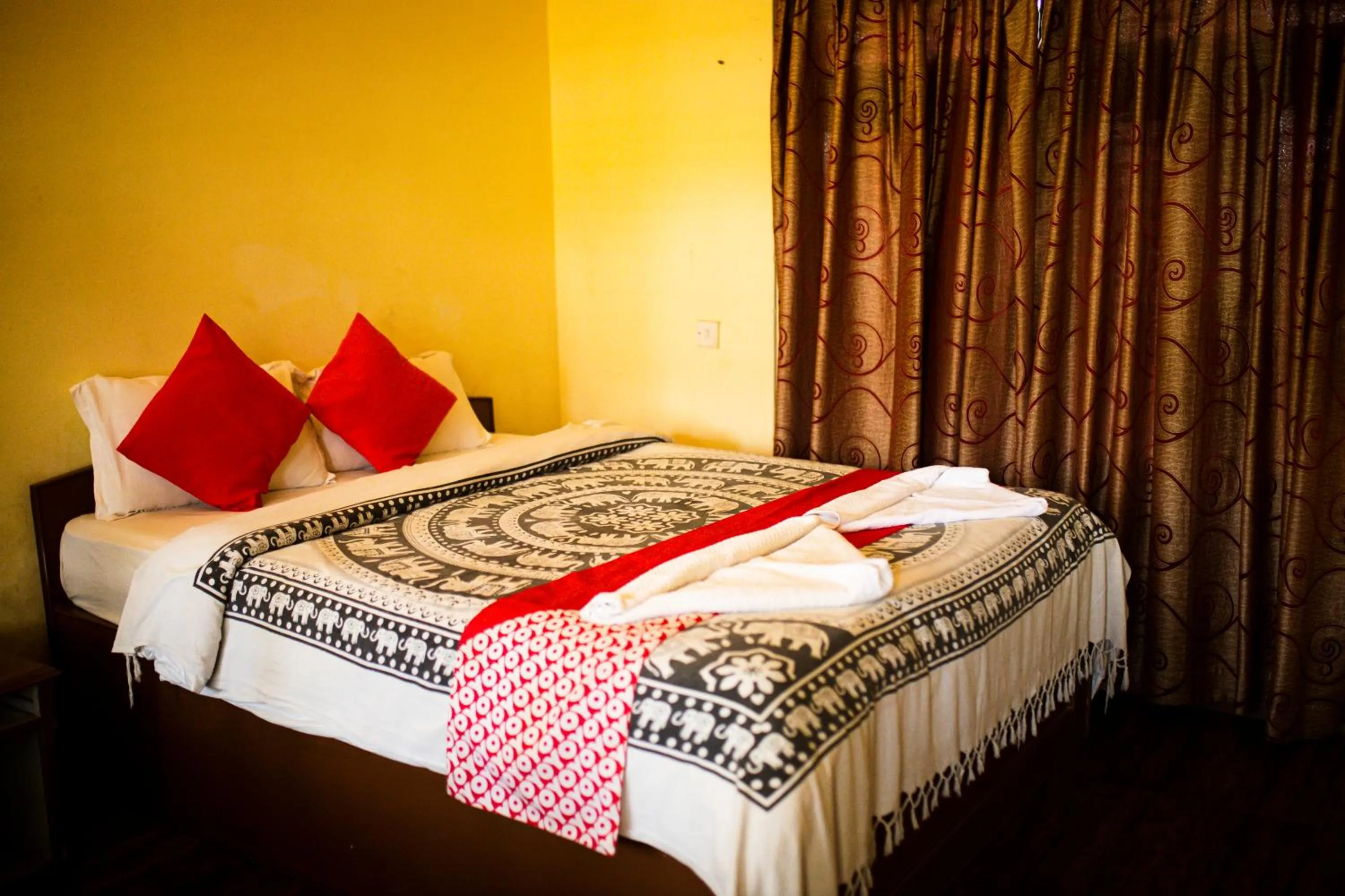 Bed in Chitwan Riverside Resort