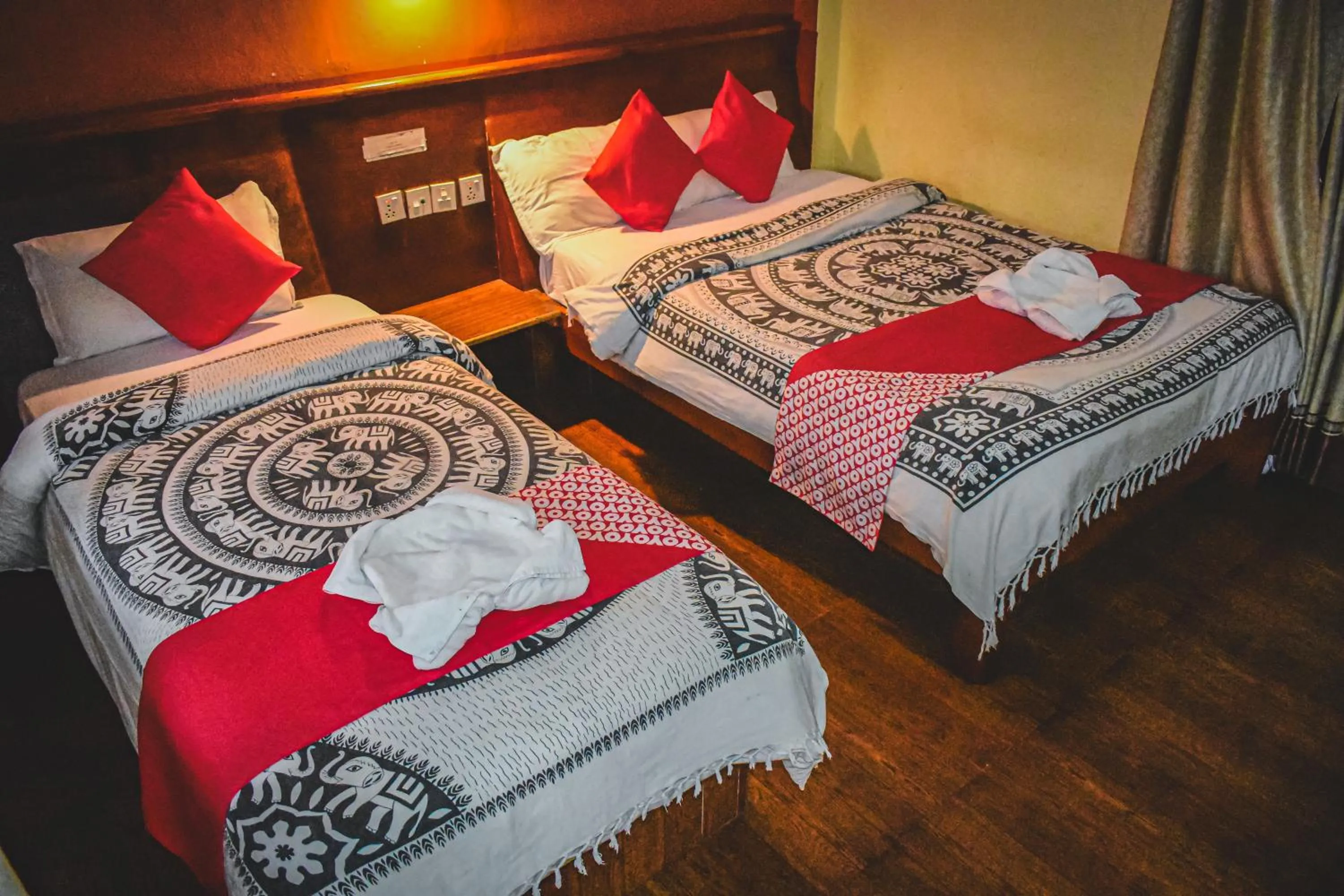Bed in Chitwan Riverside Resort