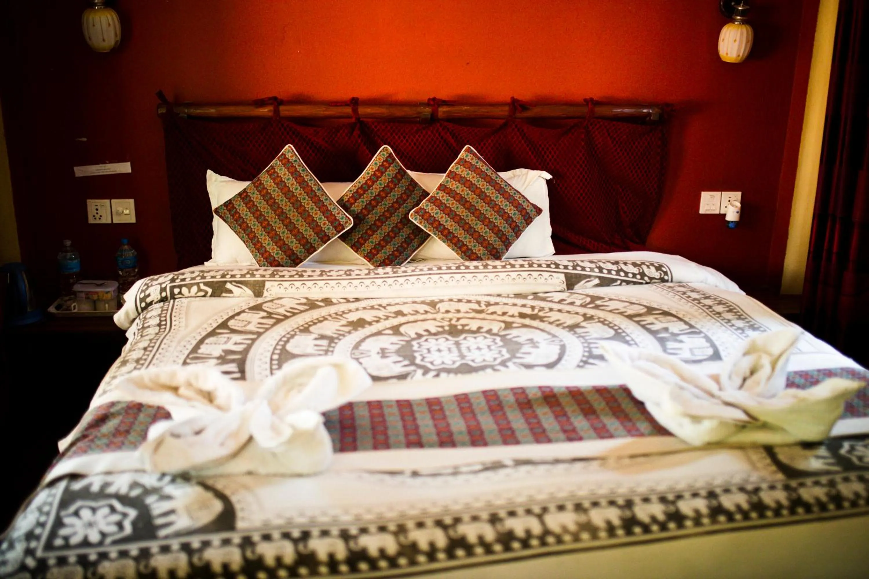 Bed in Chitwan Riverside Resort