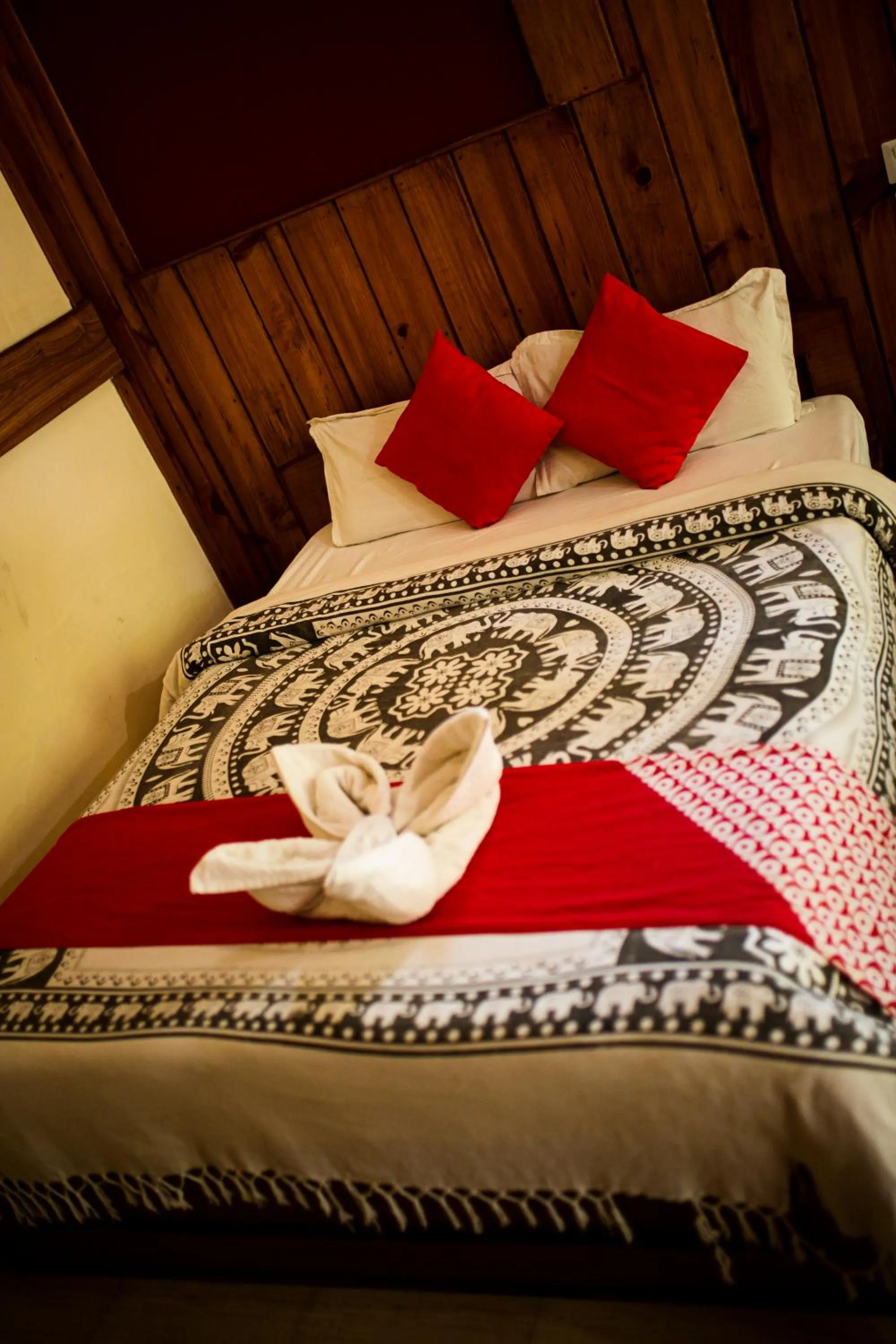 Bed in Chitwan Riverside Resort