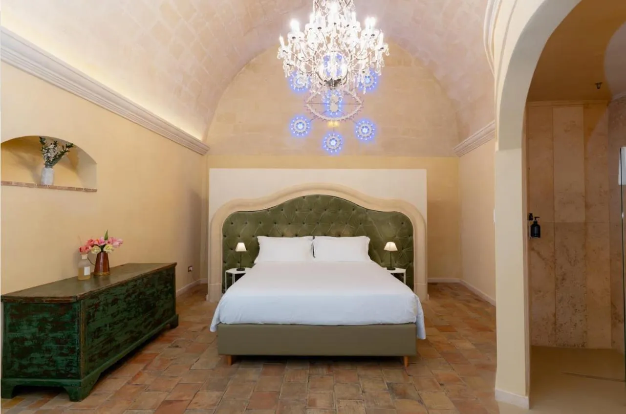 Bed in Palazzo Del Duca Hotel & Restaurant