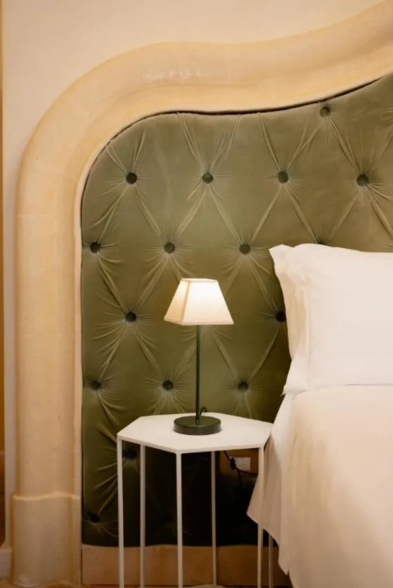 Bed in Palazzo Del Duca Hotel & Restaurant