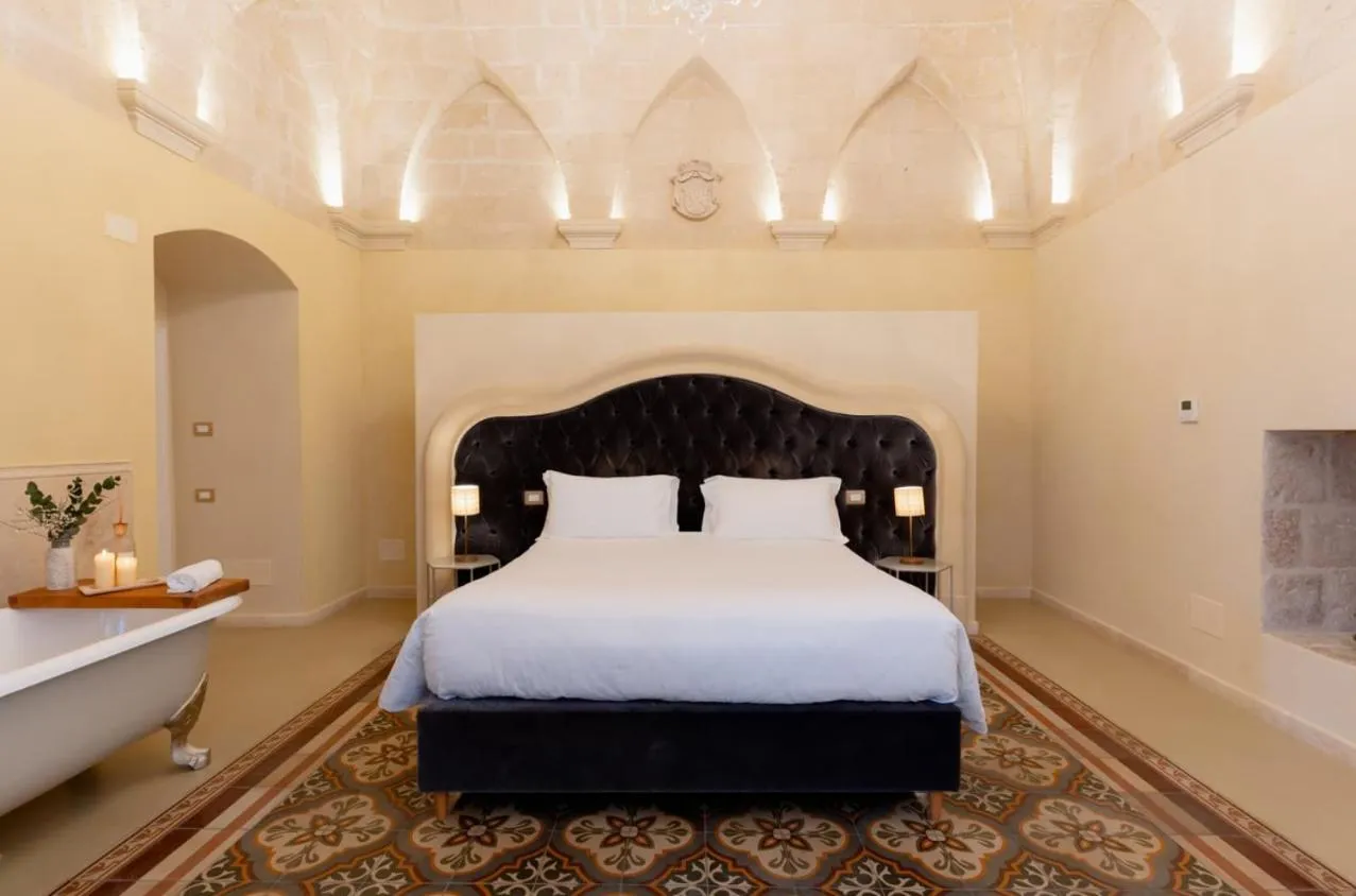 Bed in Palazzo Del Duca Hotel & Restaurant