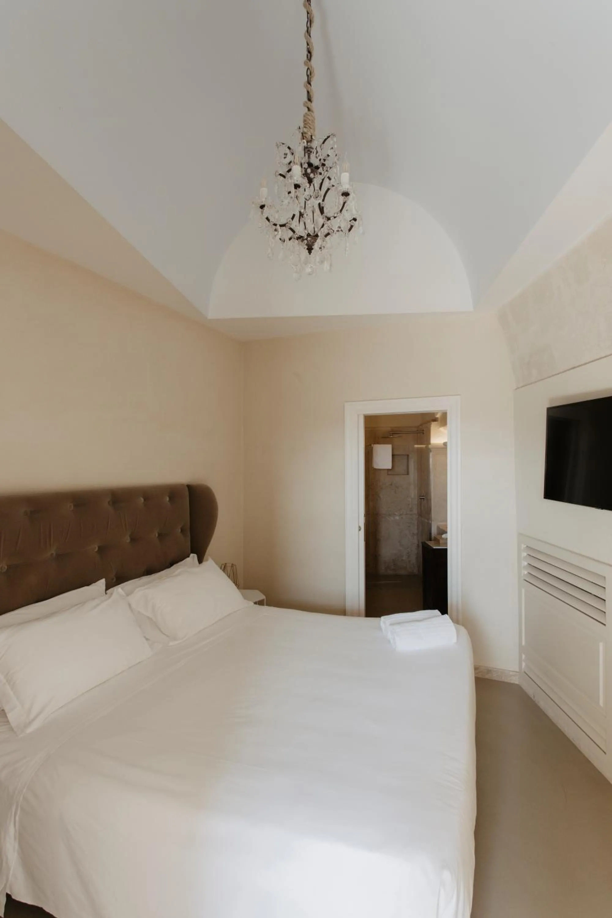 Bed in Palazzo Del Duca Hotel & Restaurant
