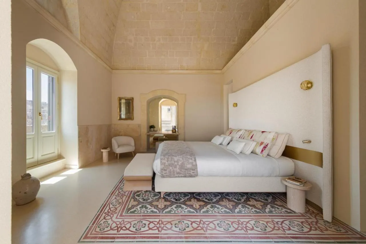 Bed in Palazzo Del Duca Hotel & Restaurant