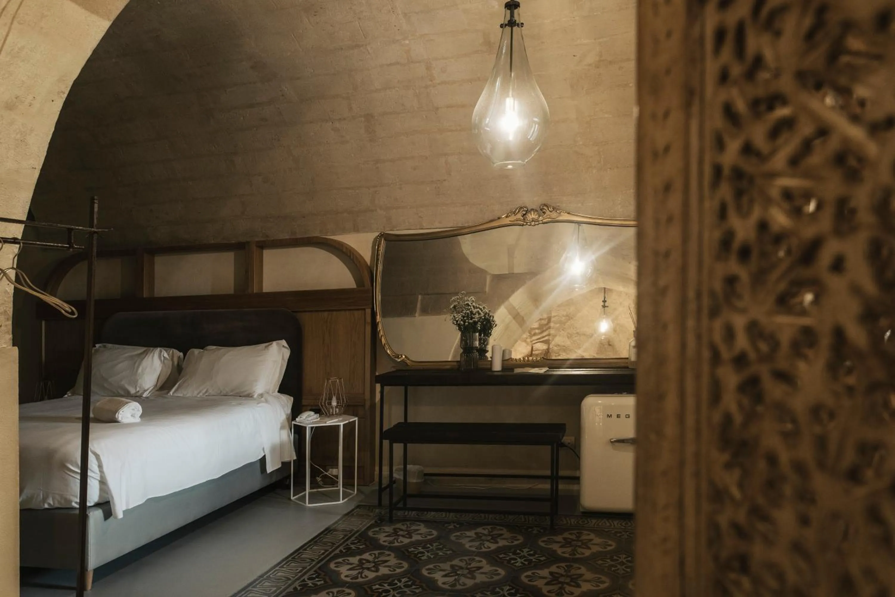 Bed in Palazzo Del Duca Hotel & Restaurant