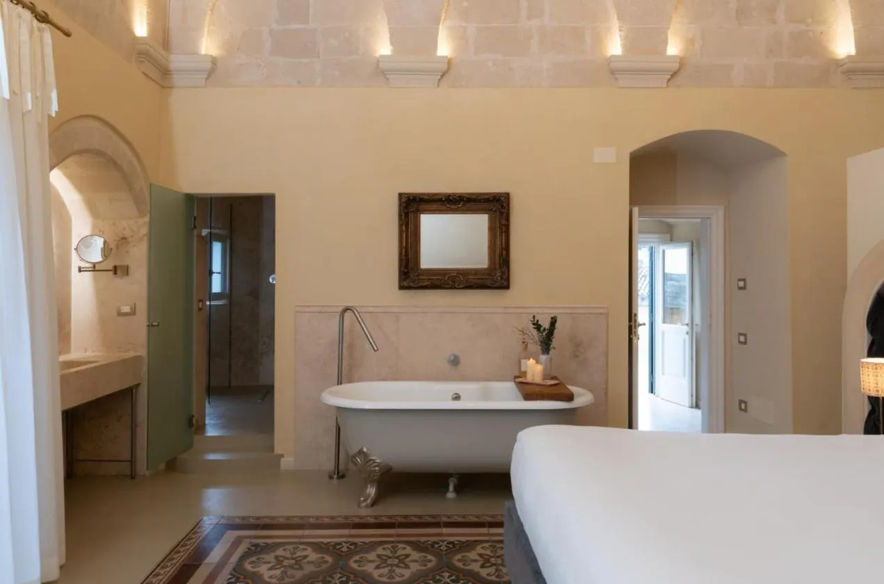 Bed in Palazzo Del Duca Hotel & Restaurant