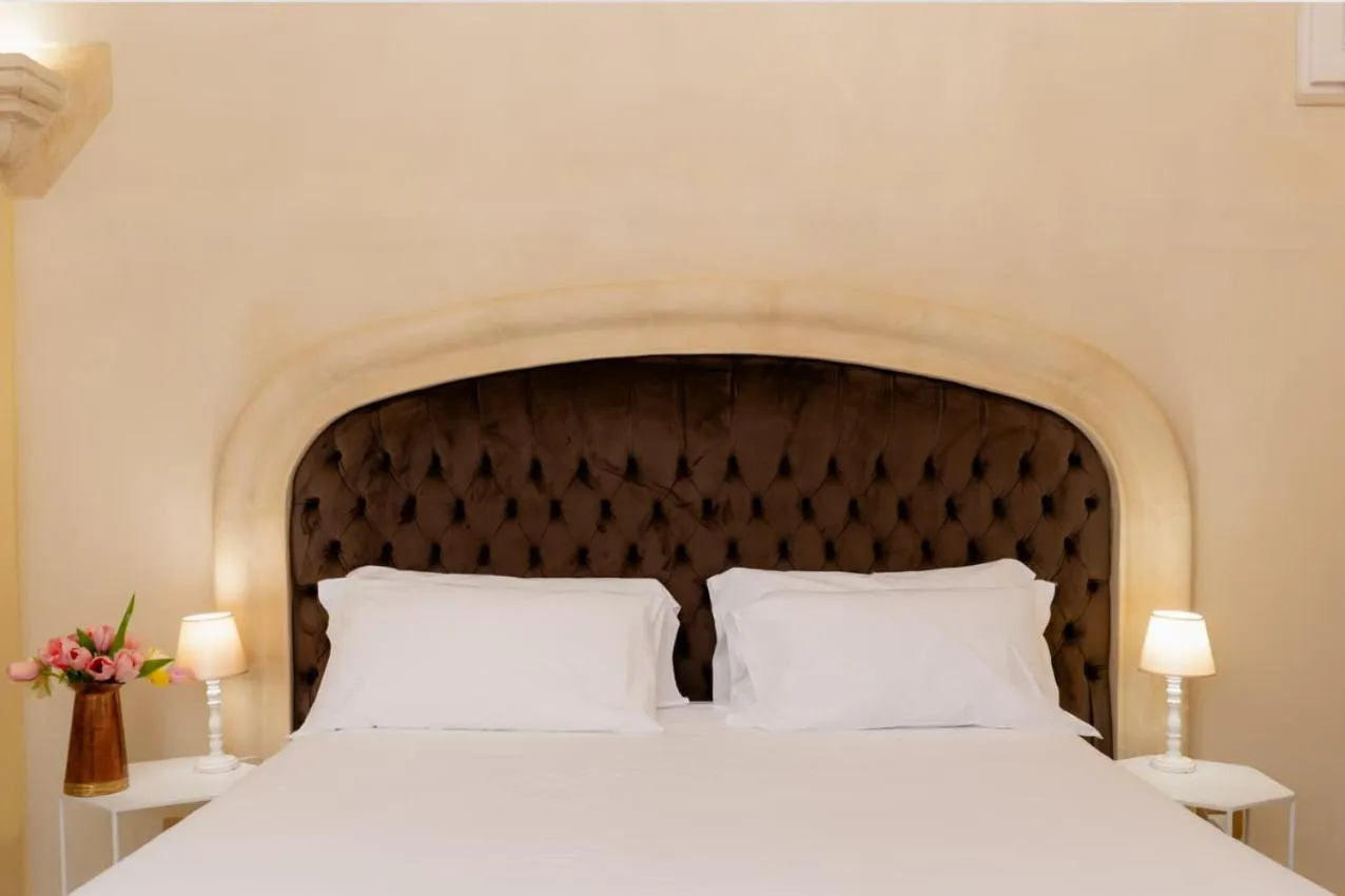 Bed in Palazzo Del Duca Hotel & Restaurant