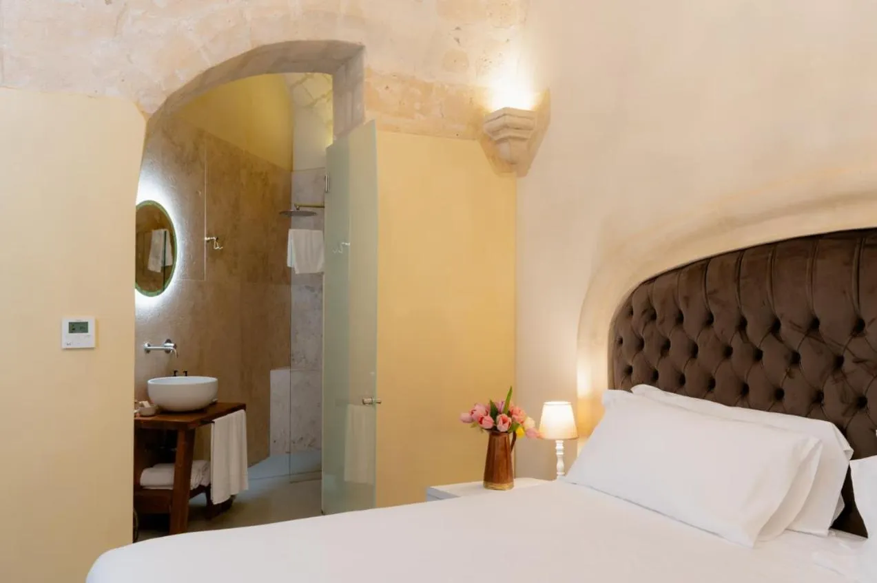 Bed in Palazzo Del Duca Hotel & Restaurant