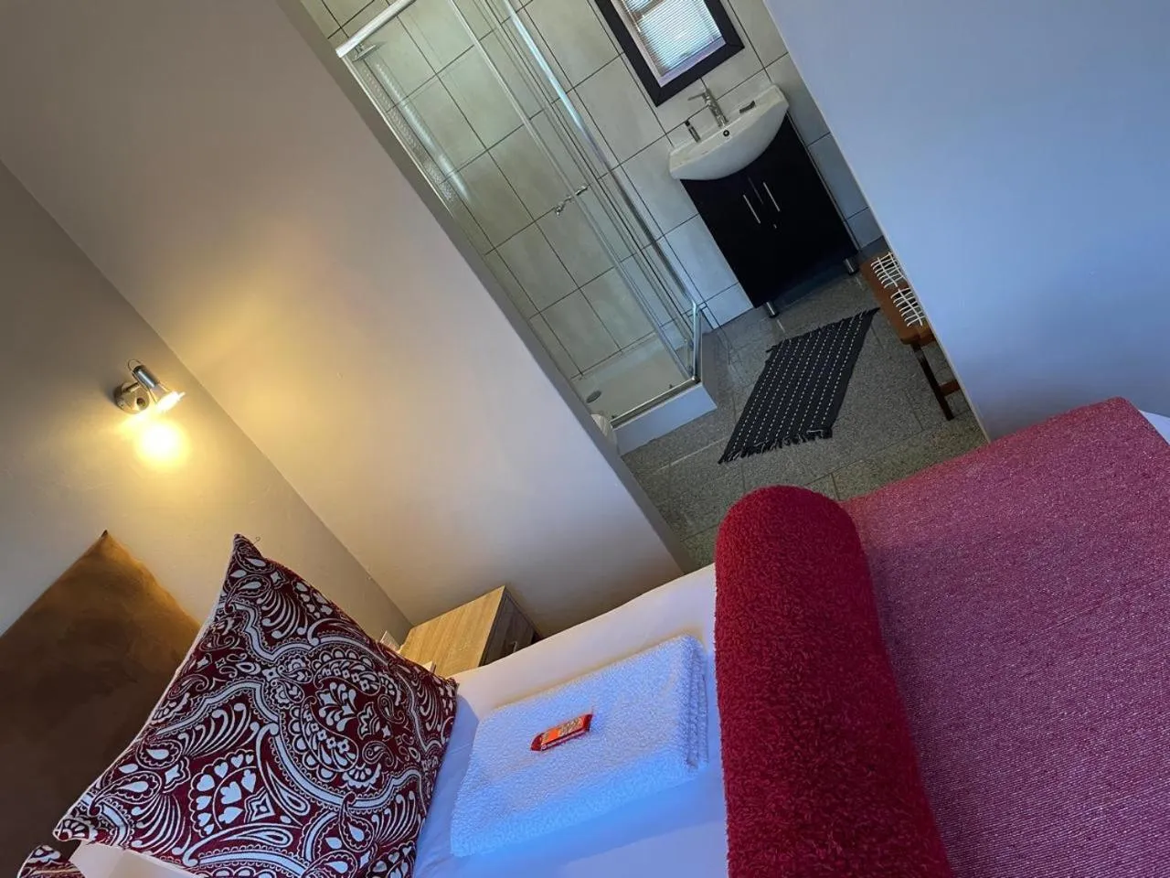 Bed in Klein Karoo Game Lodge