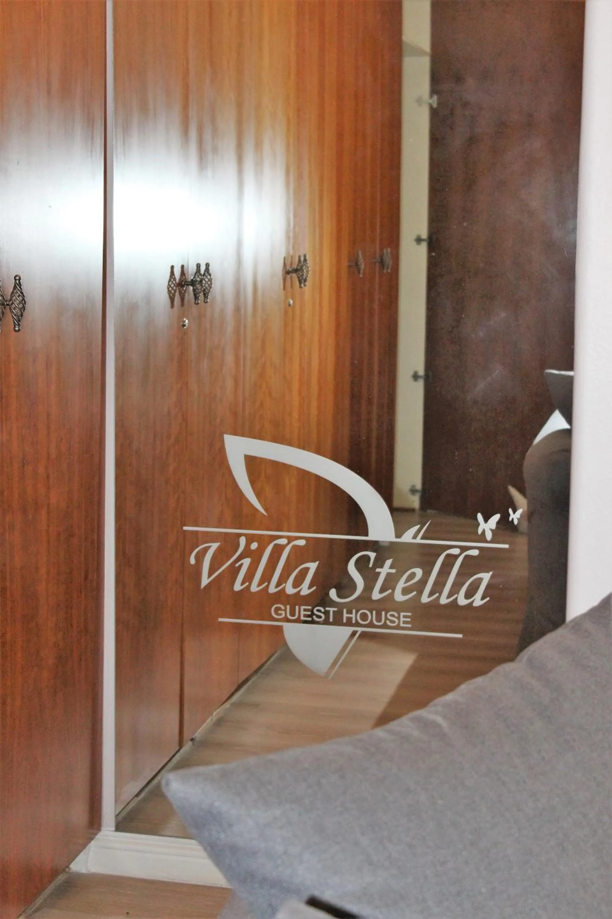 Property logo or sign in Villa Stella Guest House