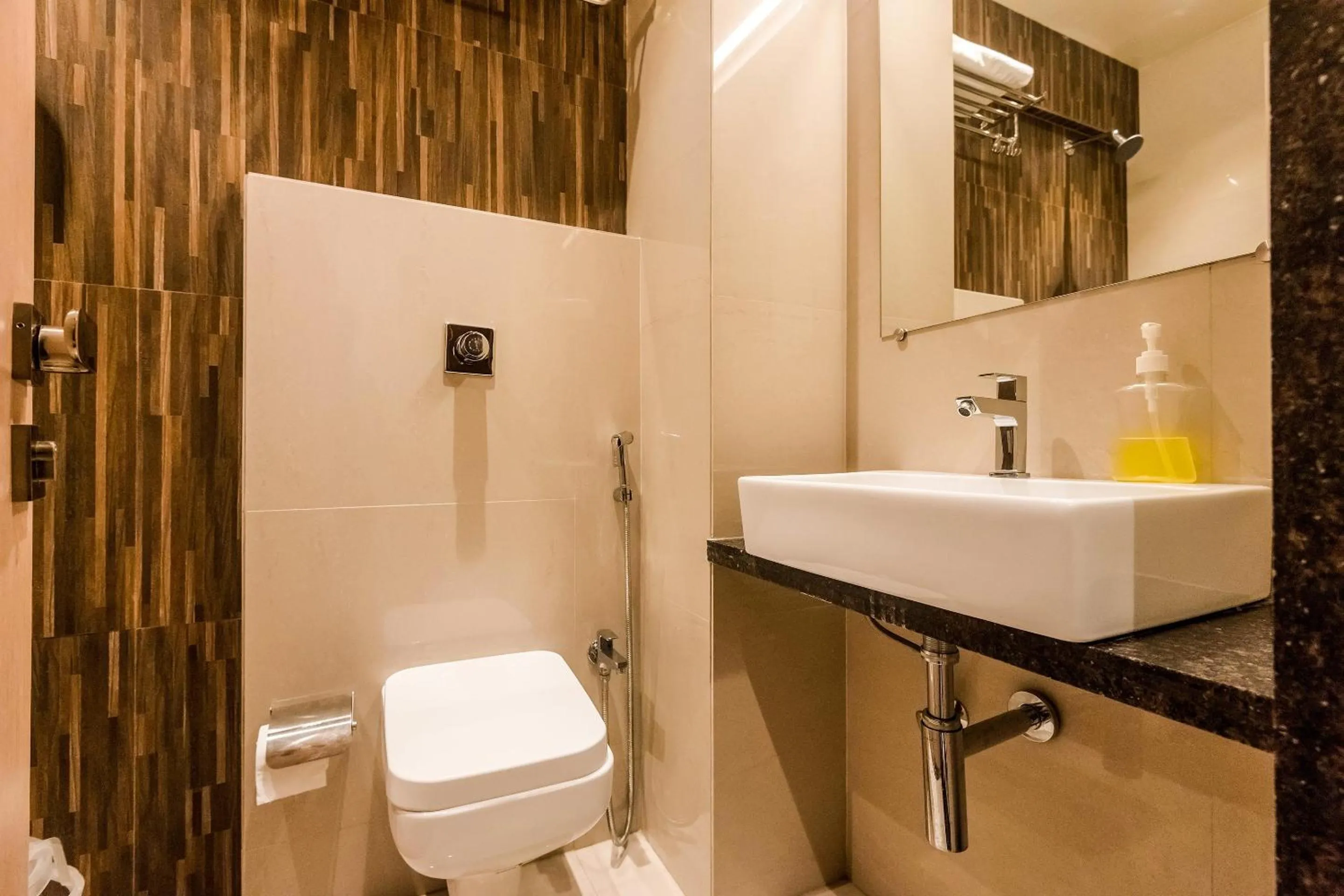 Bathroom in Capital O Hotel Konar Inn