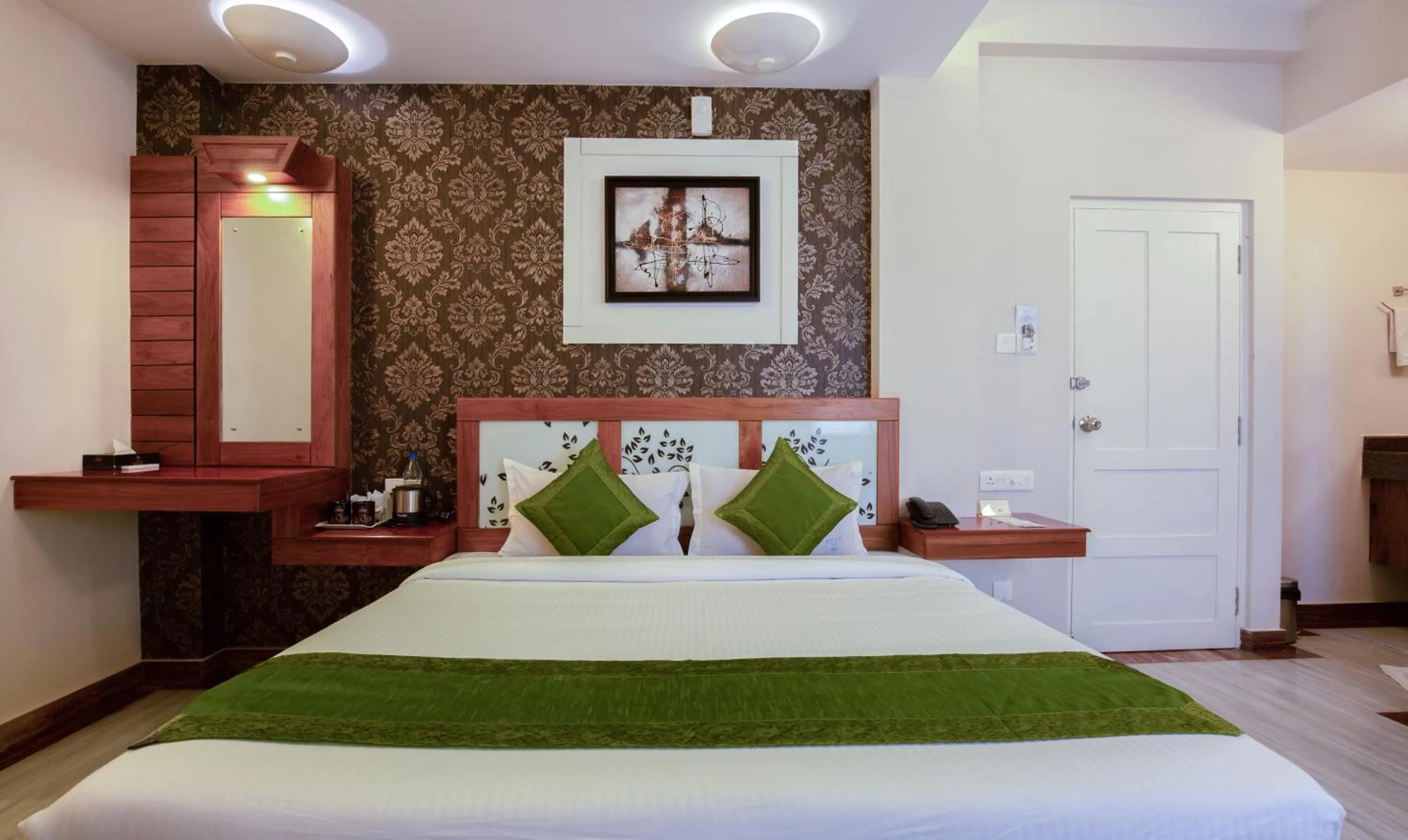 Photo of the whole room, Bed in Treebo The Qasr