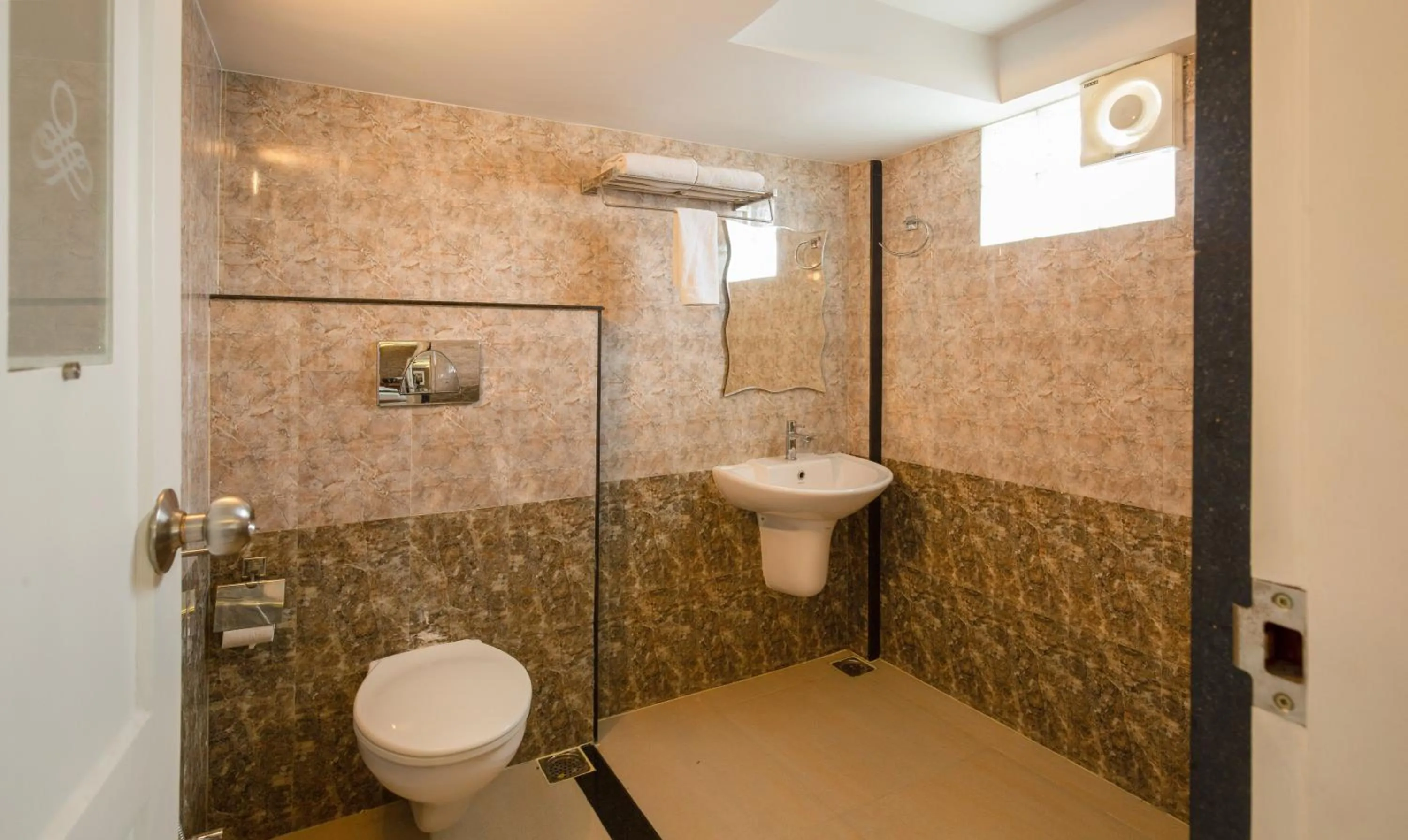 Toilet in Treebo The Qasr