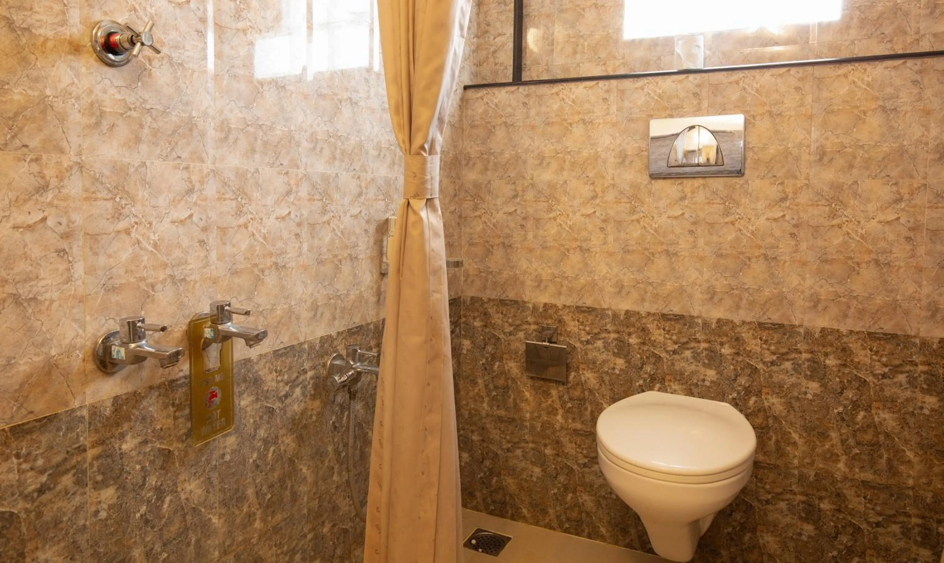 Bathroom in Treebo The Qasr