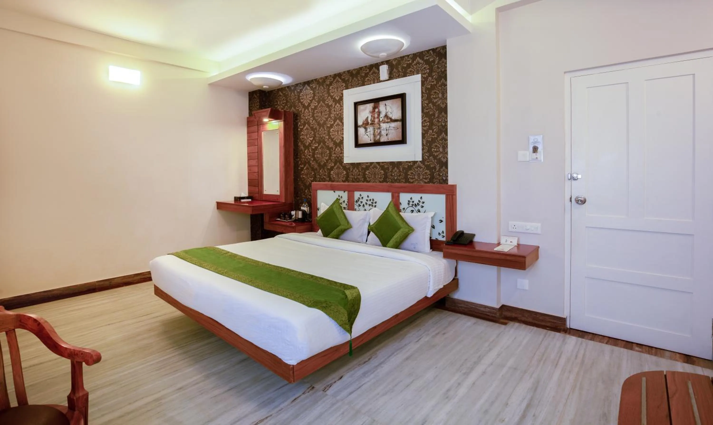 Photo of the whole room, Bed in Treebo The Qasr