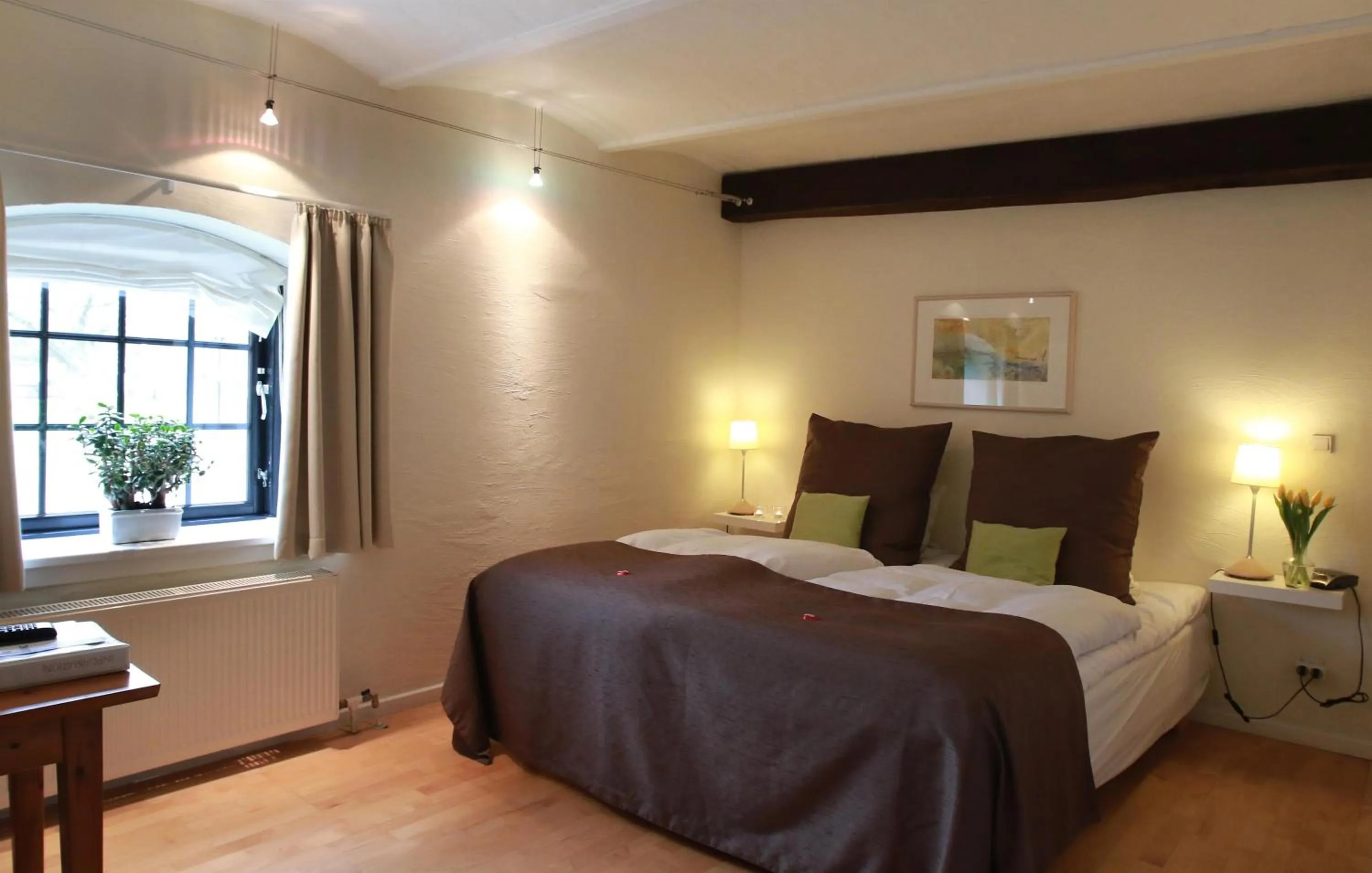 Bed in Benniksgaard Hotel