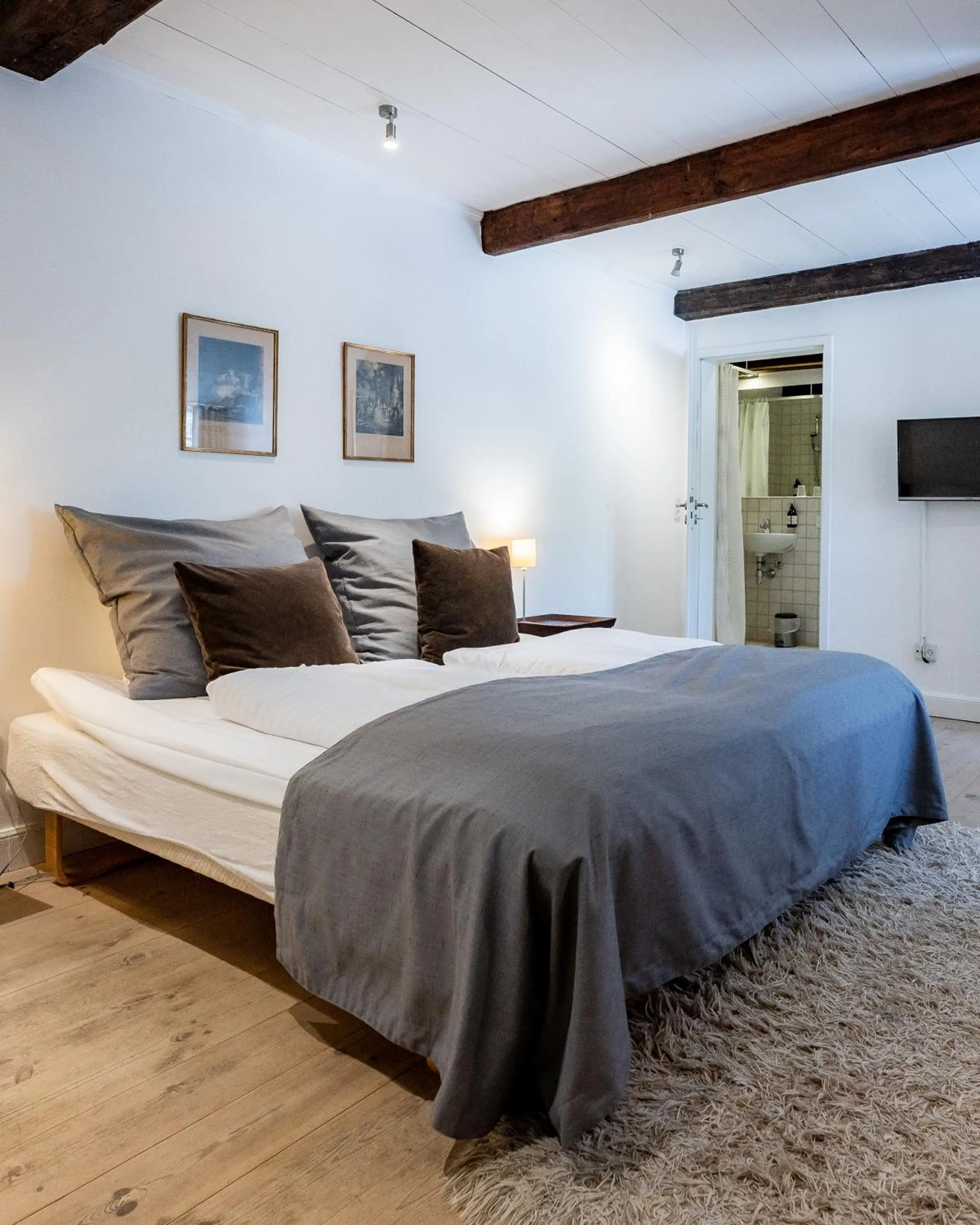 Bed in Benniksgaard Hotel