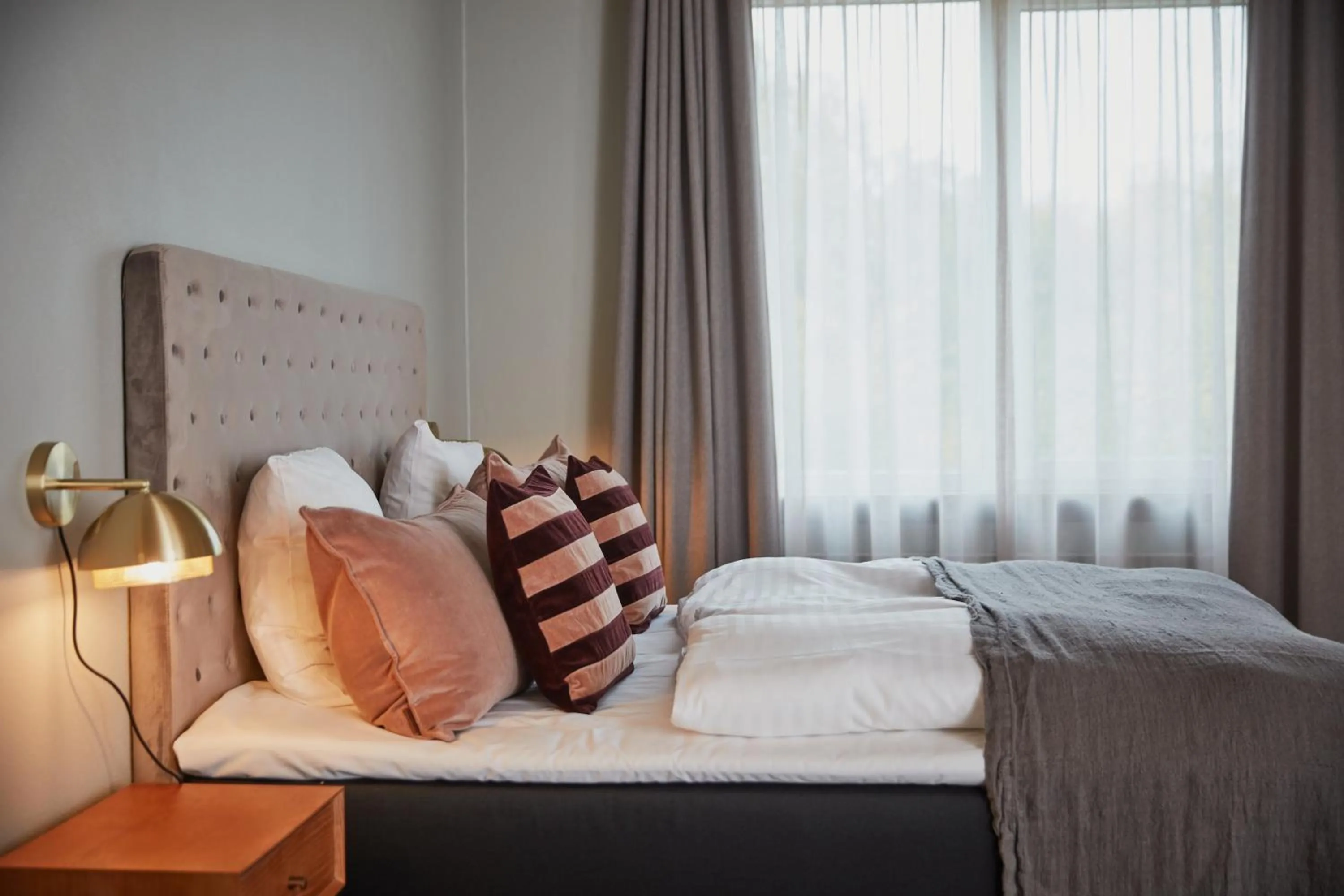 Bed in Benniksgaard Hotel