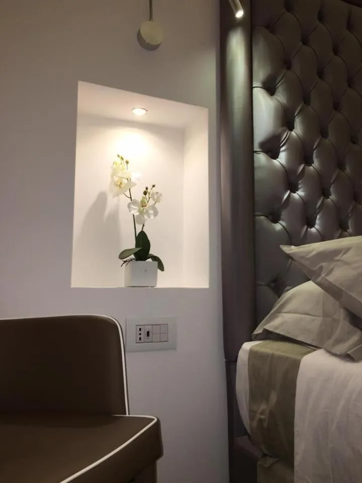 Seating area, Bed in Antico Corso Charme